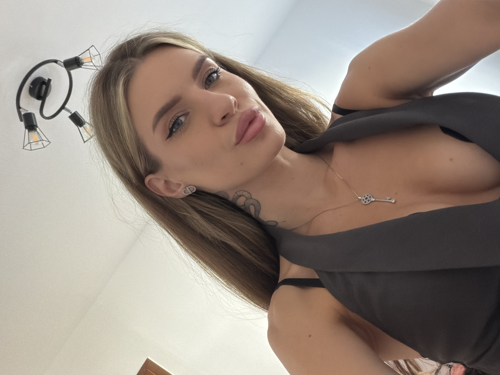 Blonde woman photographed with slight pout in Berlin
