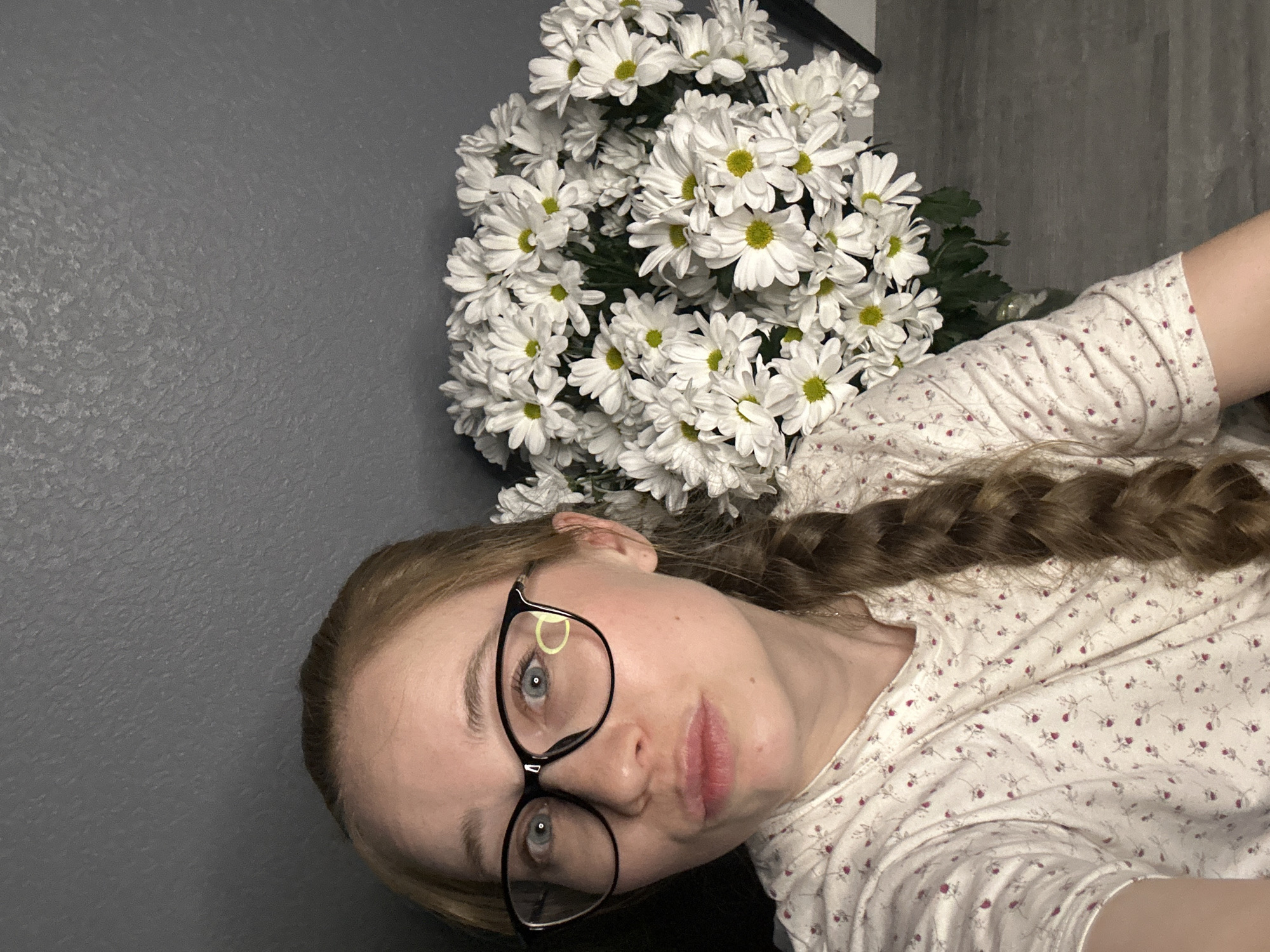 Woman documents evening with flowers and beer in Saint Petersburg