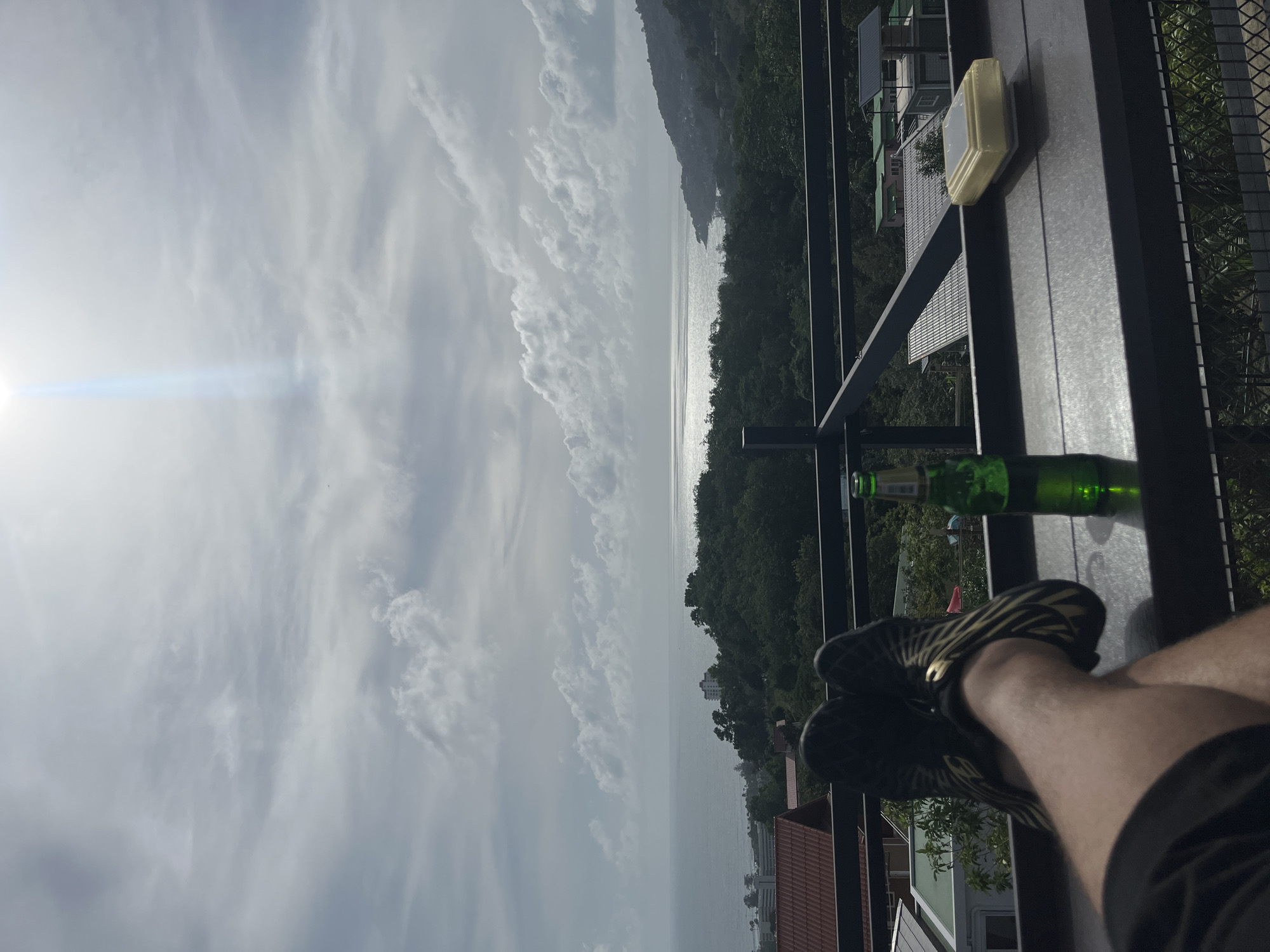 Person spotted on balcony overlooking Karon coast