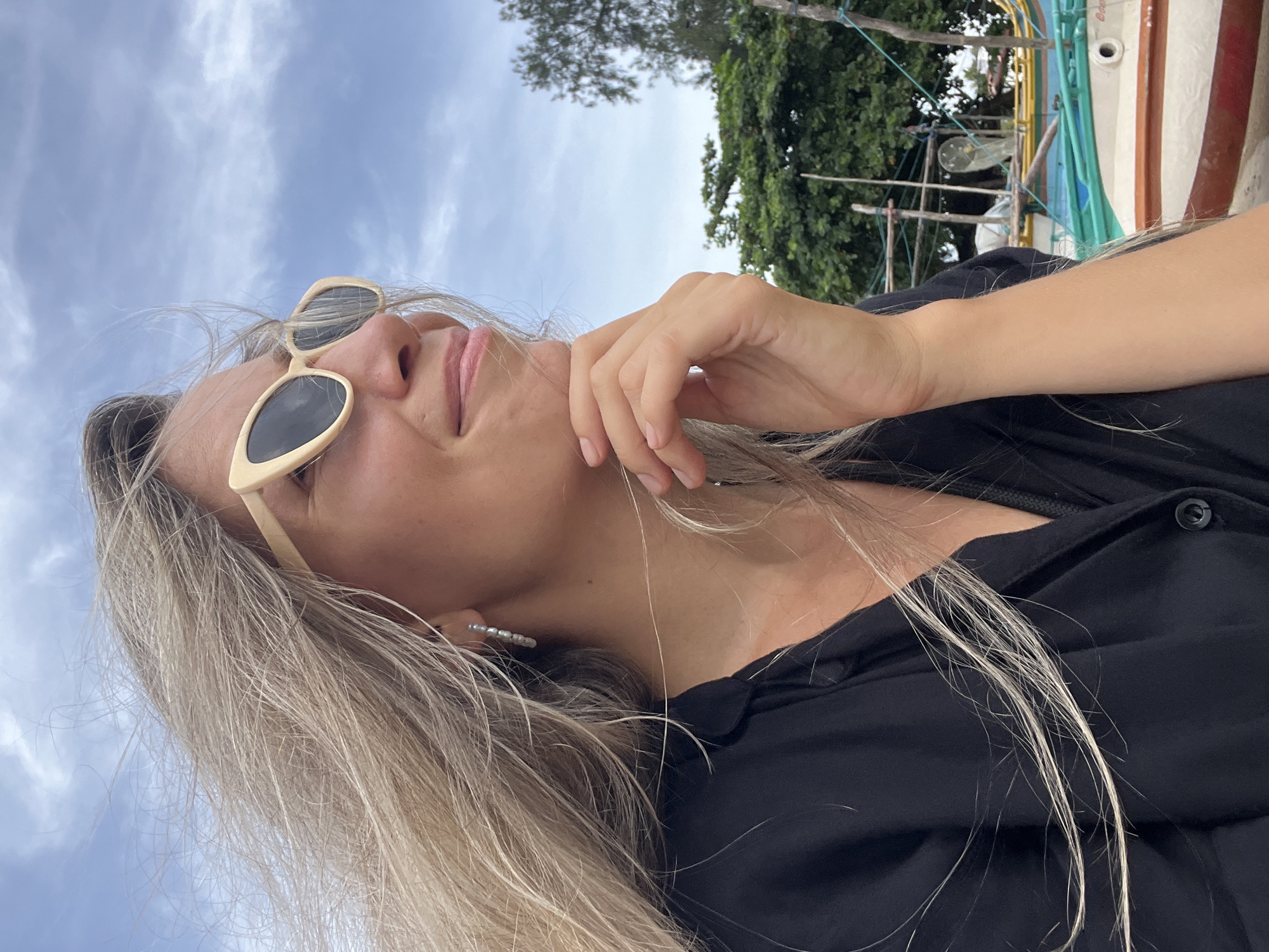 Weligama beach: selfies, shore birds, and a fishing boat