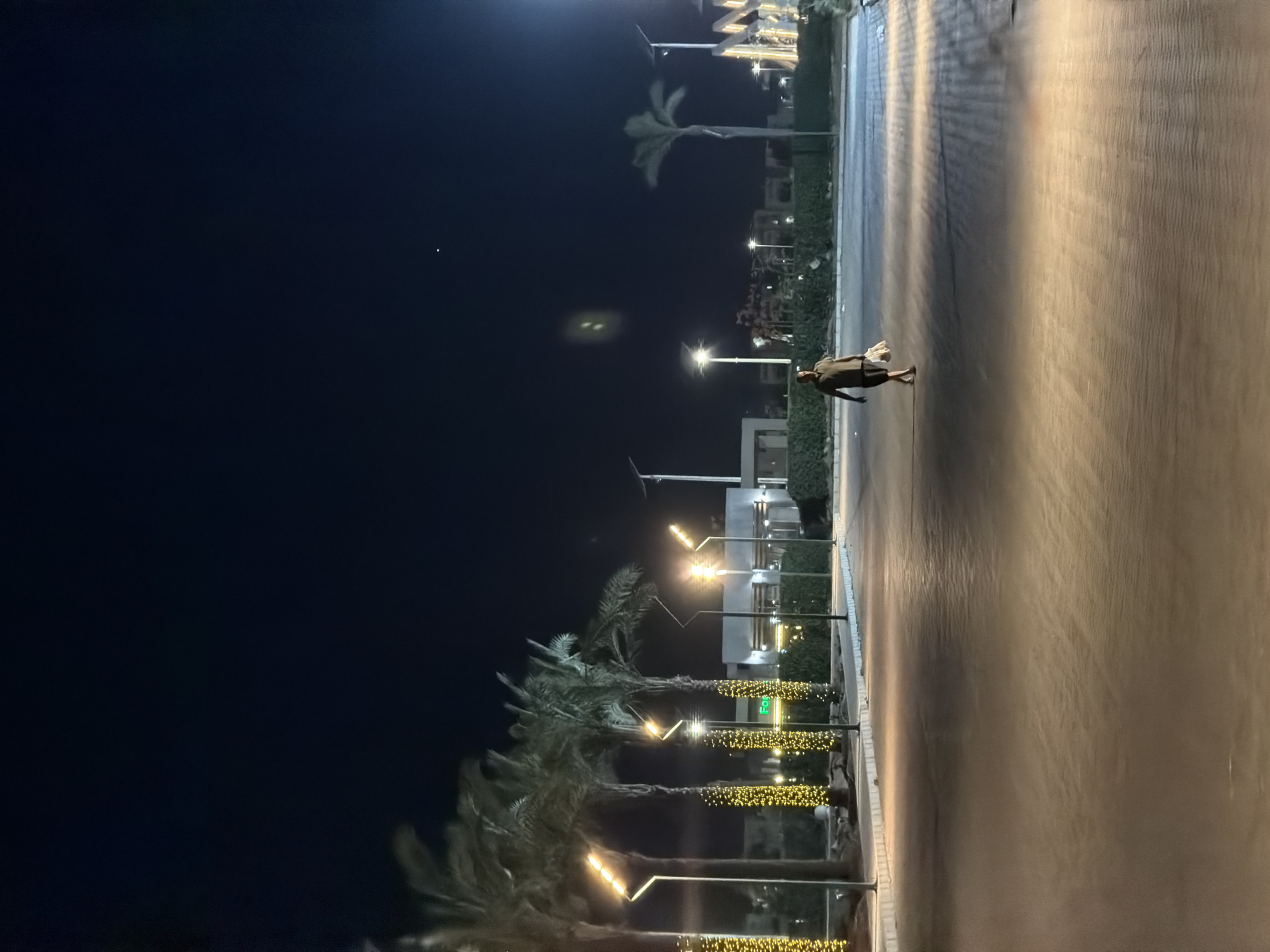 Nighttime stroll through Sharm El Sheikh's lit promenade and shops