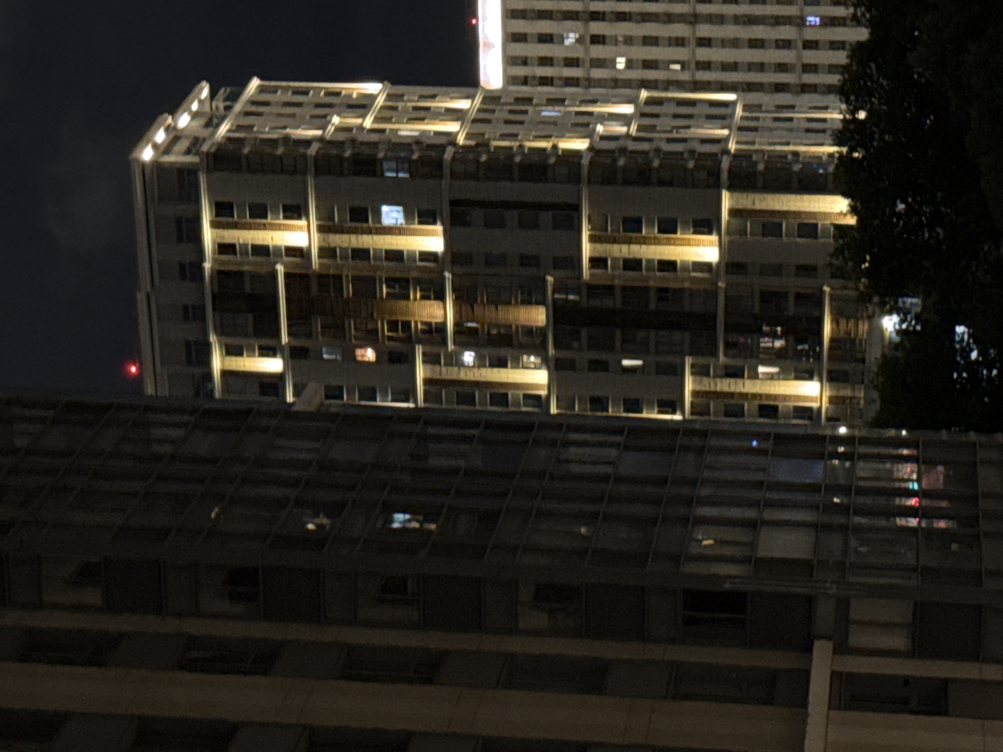 Khimki nights: tower blocks, wet roses, and a 3D printer at work