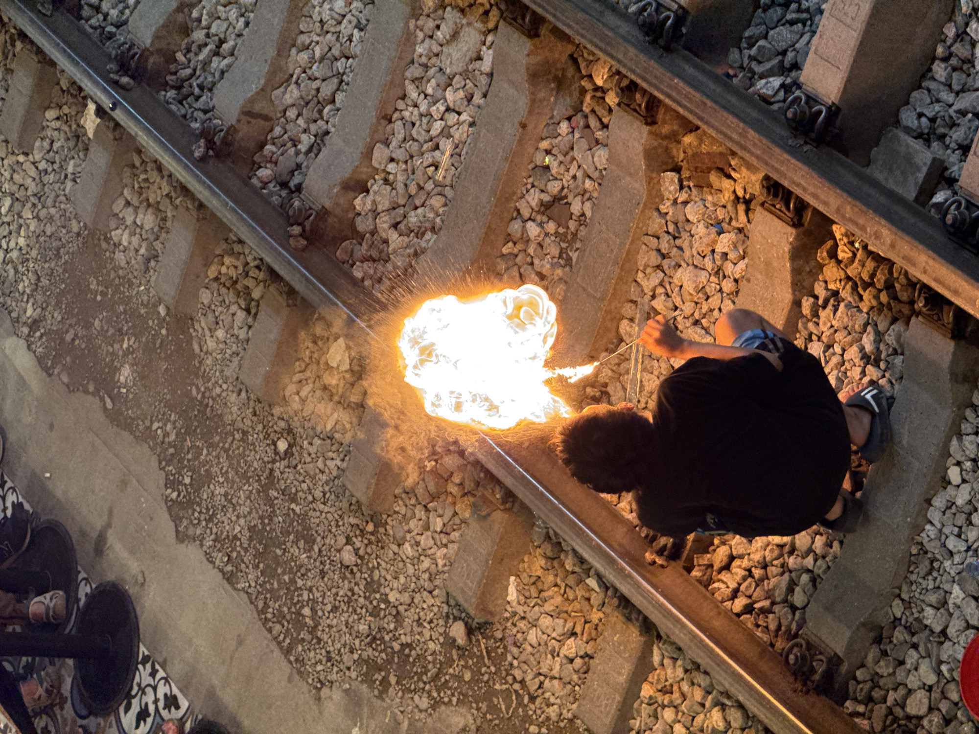 Flare work on Hanoi's famous Train Street tracks
