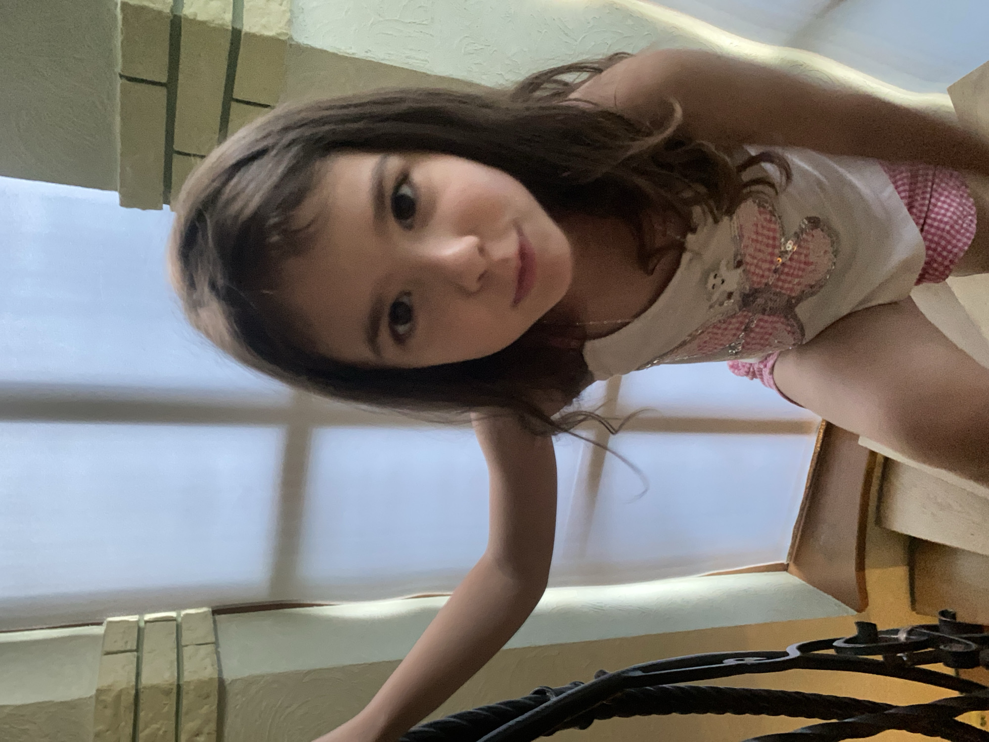 Glimpses of a home interior, piano, and a Ukrainian coin