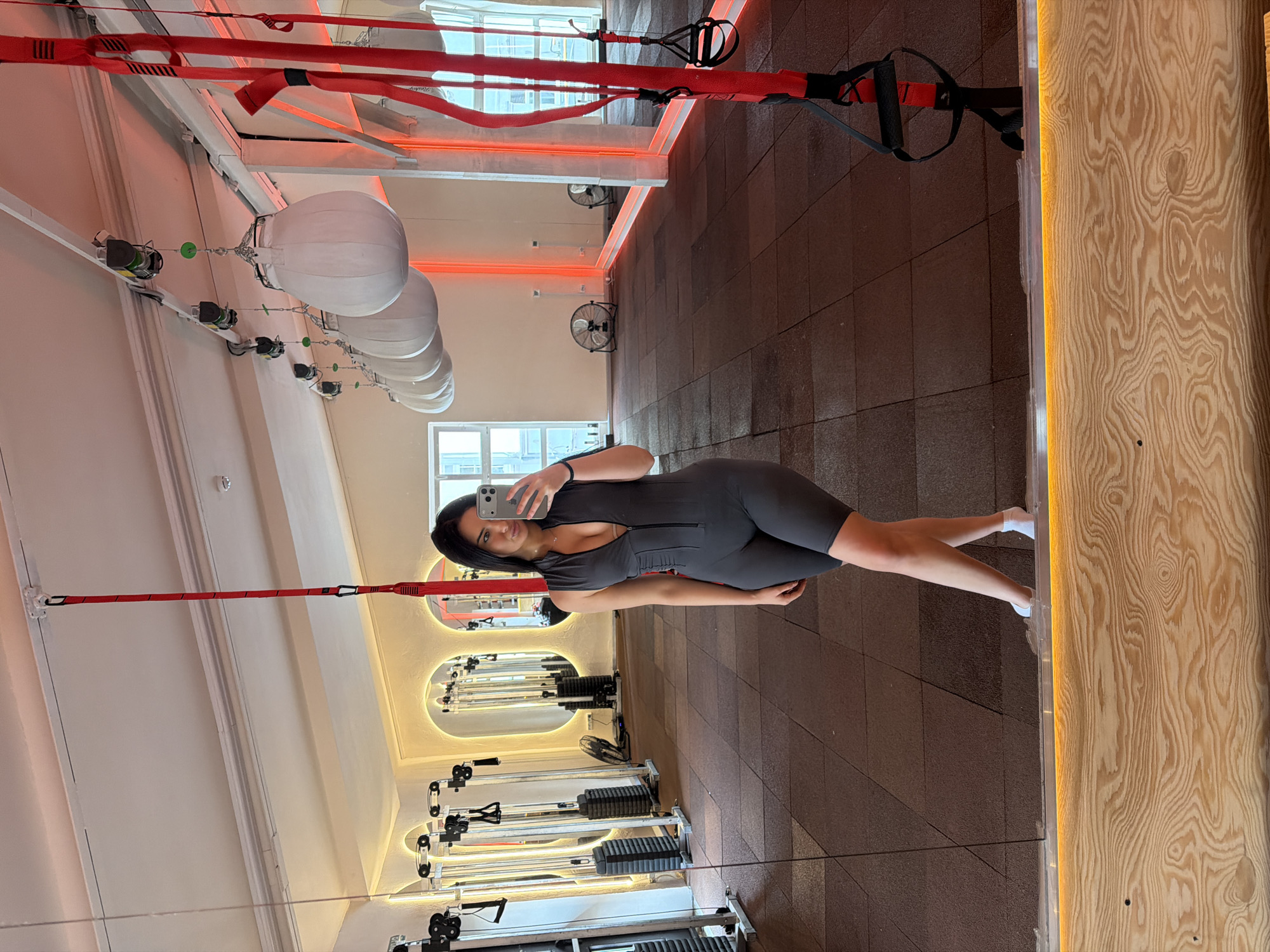 Woman takes gym selfie in Moscow fitness center