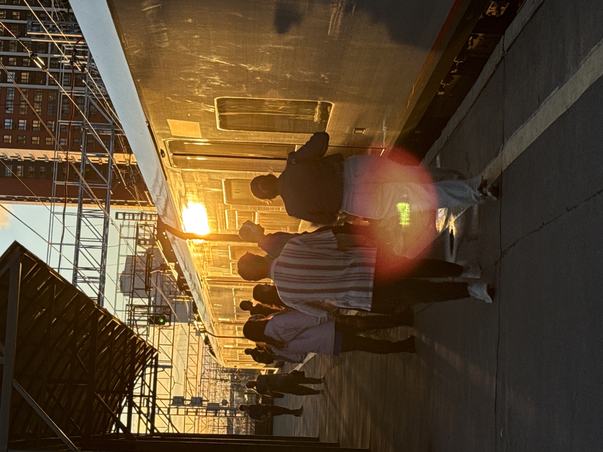 Moscow train station at sunset, platforms and tracks in golden light