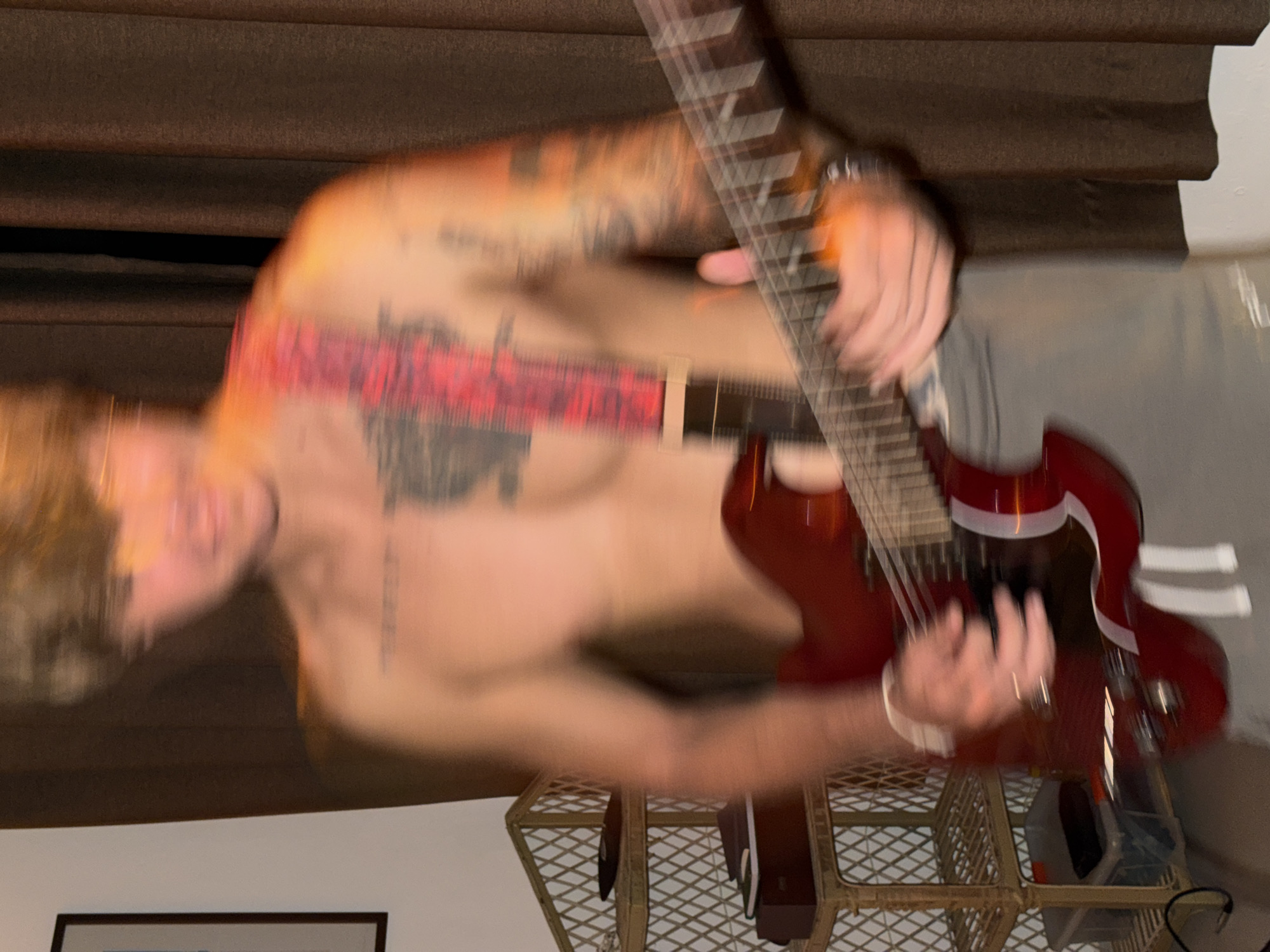 Late-night guitar session in a coastal Sri Lanka room
