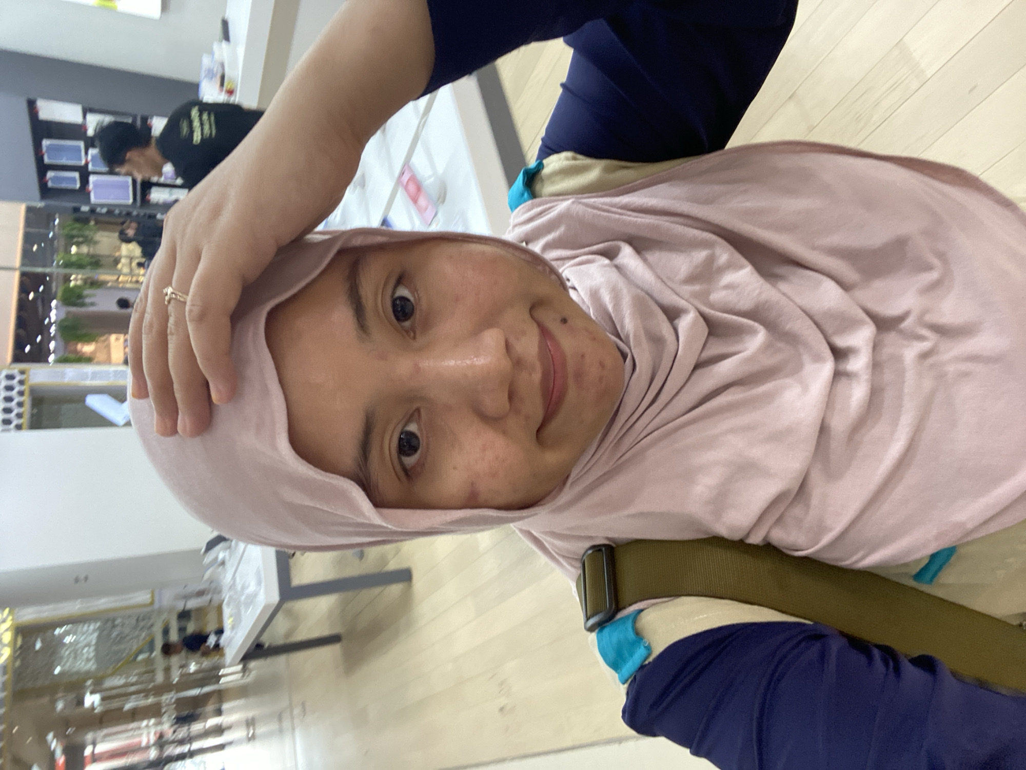 Morning out in Banjarbaru — car, futsal court, and the mall