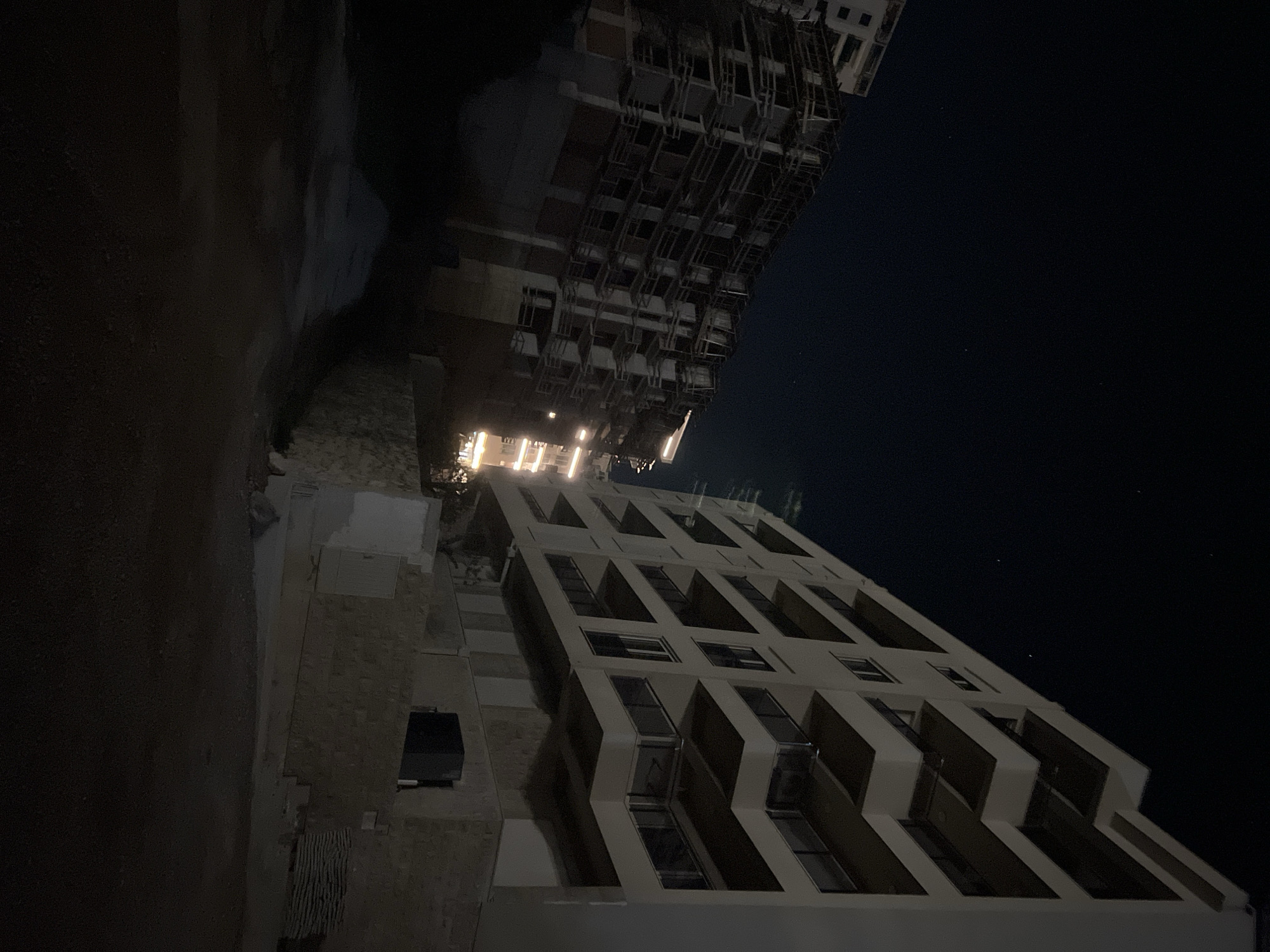 Night view of residential buildings in Boreti, Montenegro
