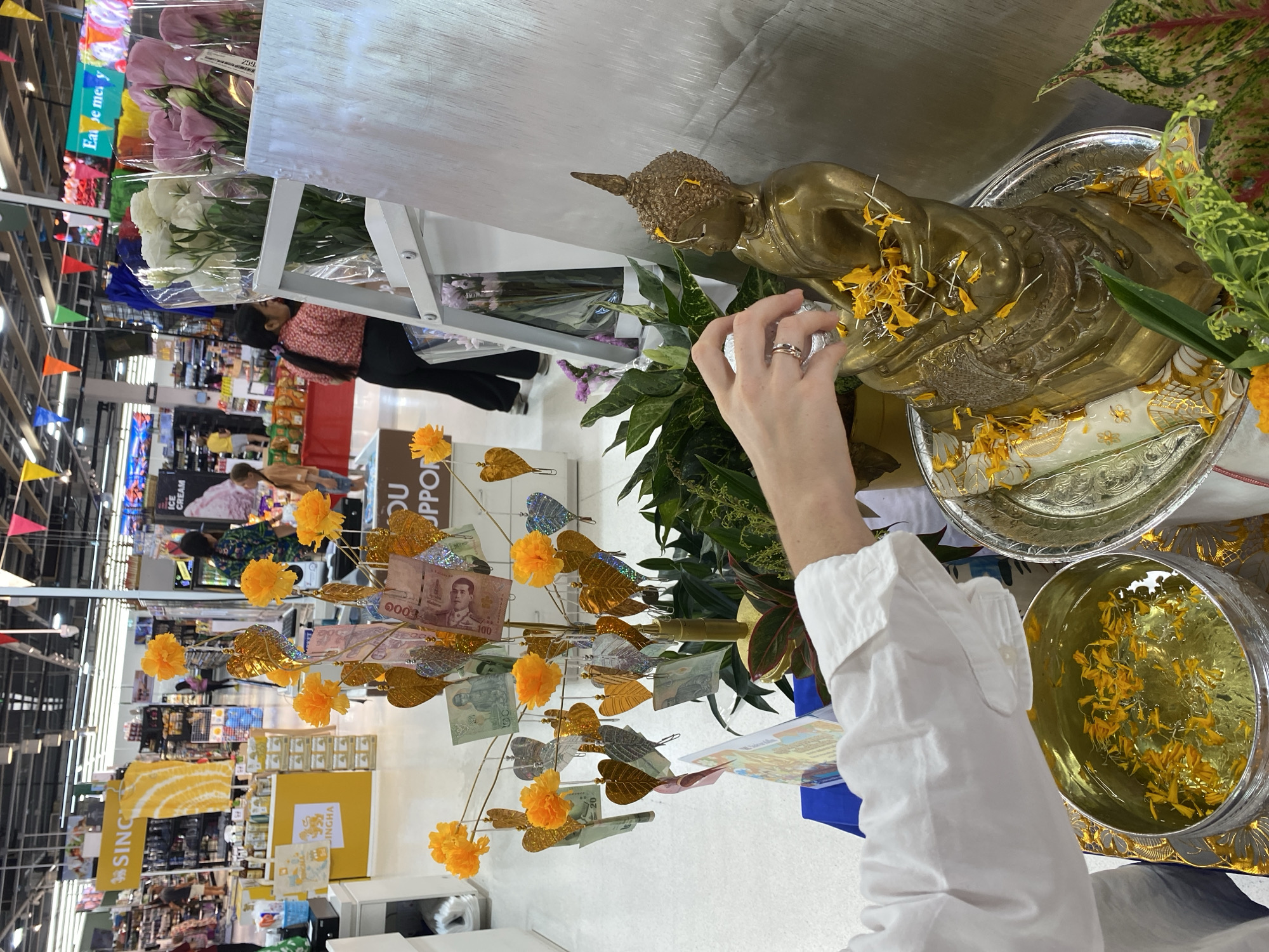 Buddha blessing ritual observed at Thai restaurant