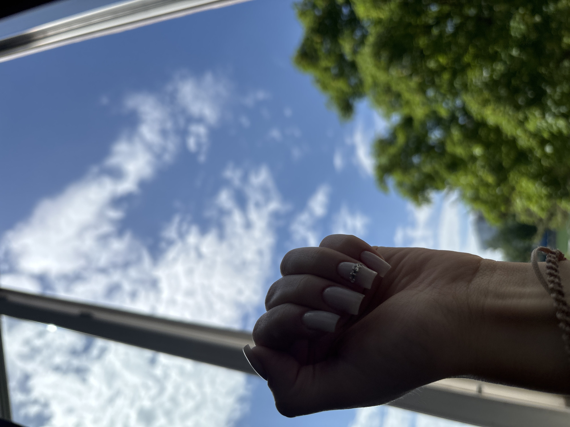 Decorated Hand Clenched Into Fist Captured at Unknown Location
