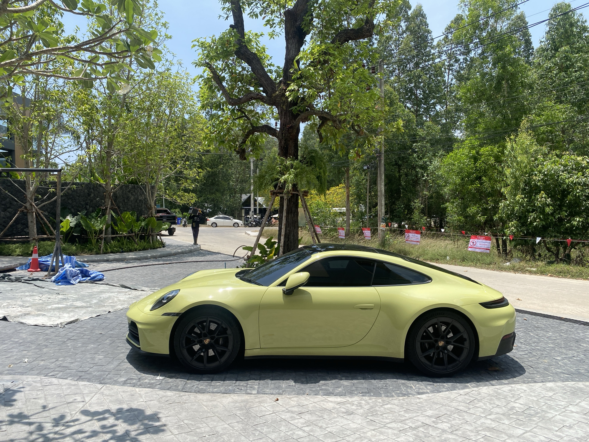 Yellow Porsche 911 spotted parked in Choeng Thale, Thailand