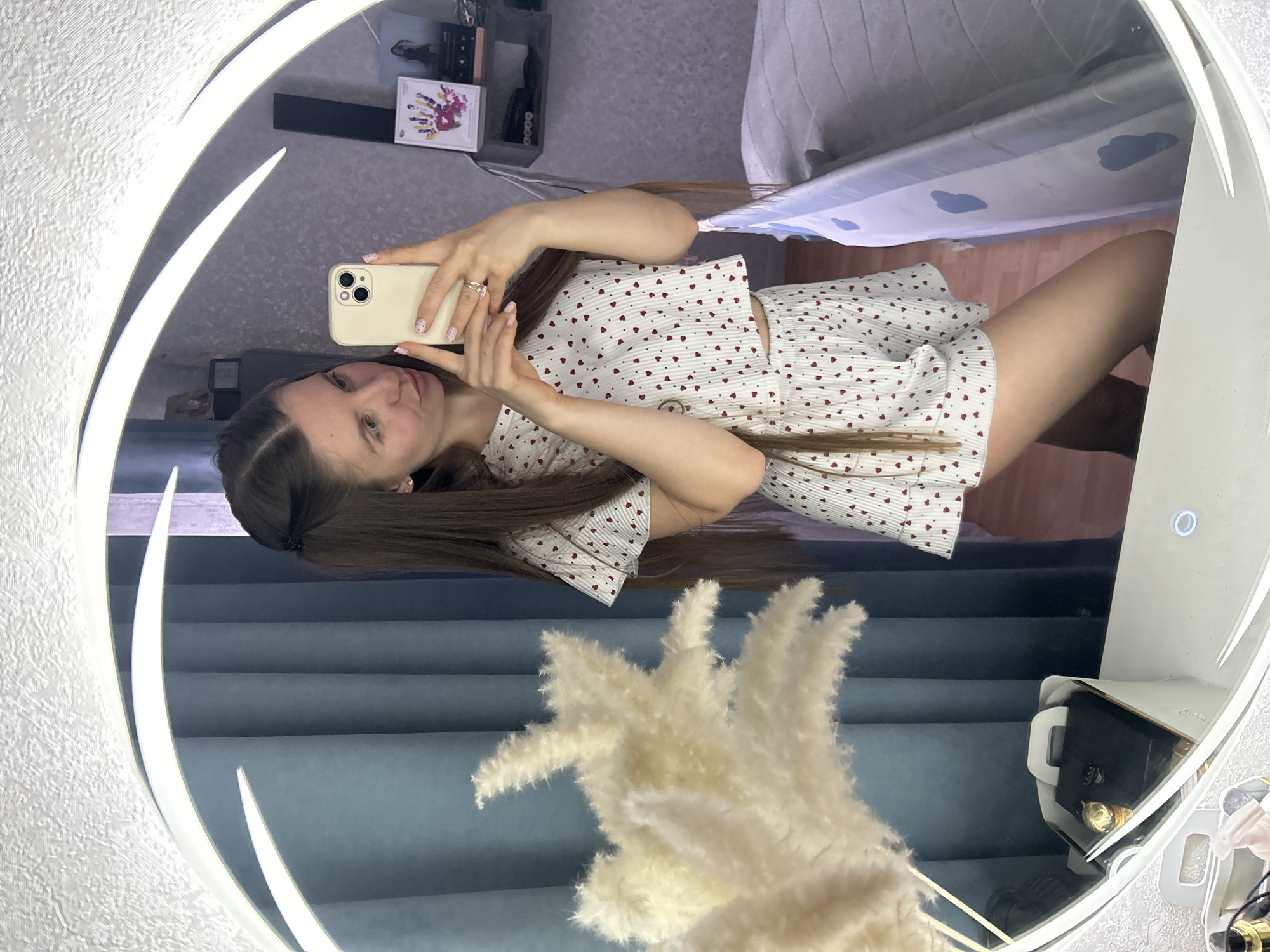 Woman takes ring light selfie in Klin, Russia