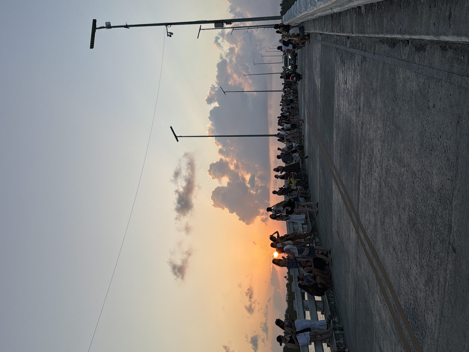Crowds gather on bridge in General Luna, Philippines