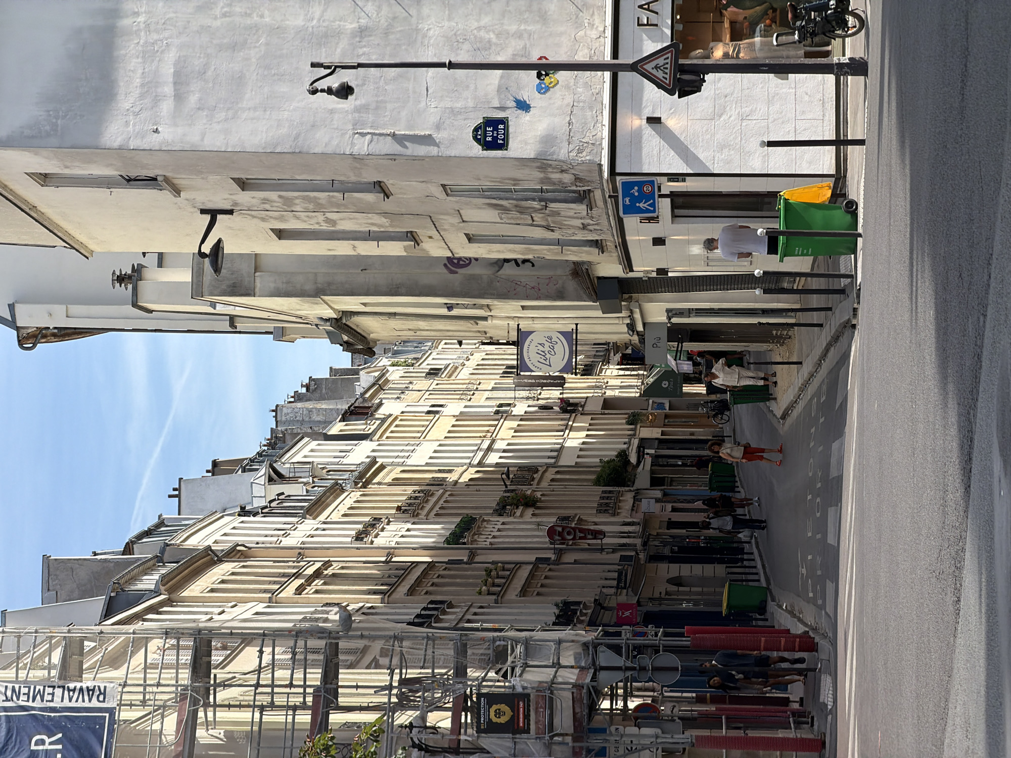 Sunny morning on classic Haussmannian streets in Paris