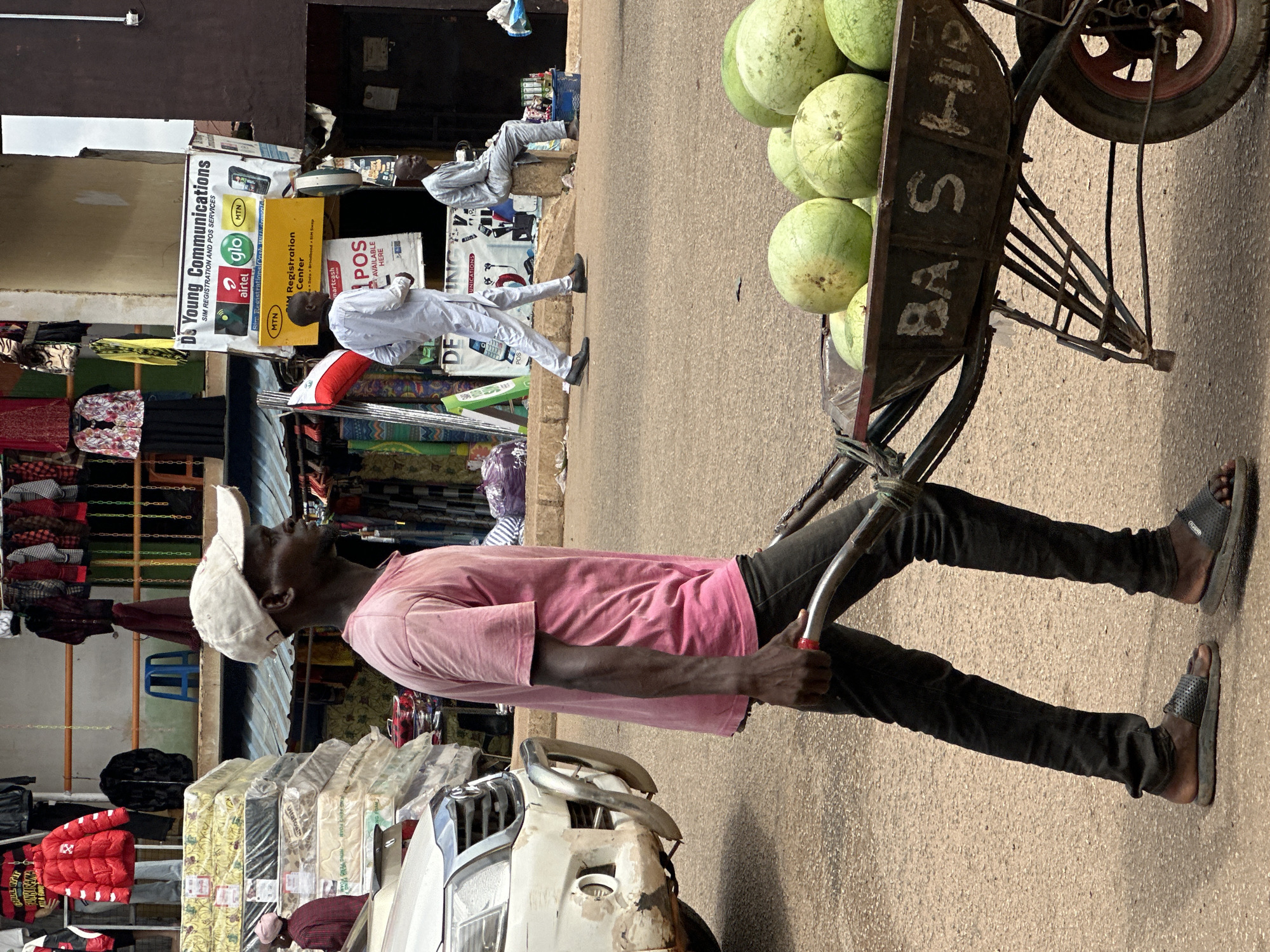 Morning street life and commerce in Bukuru, Nigeria