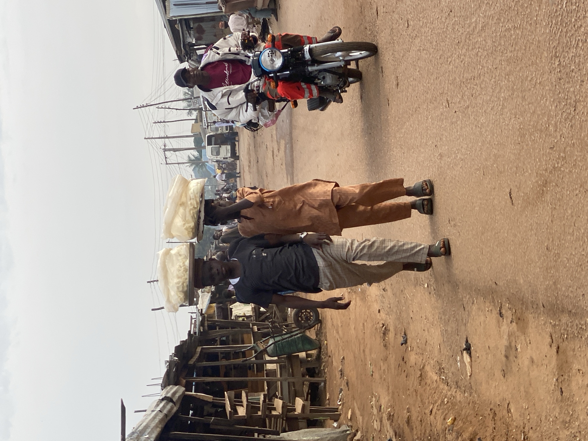 Sabon Tasha market morning: livestock, produce, and street commerce in motion