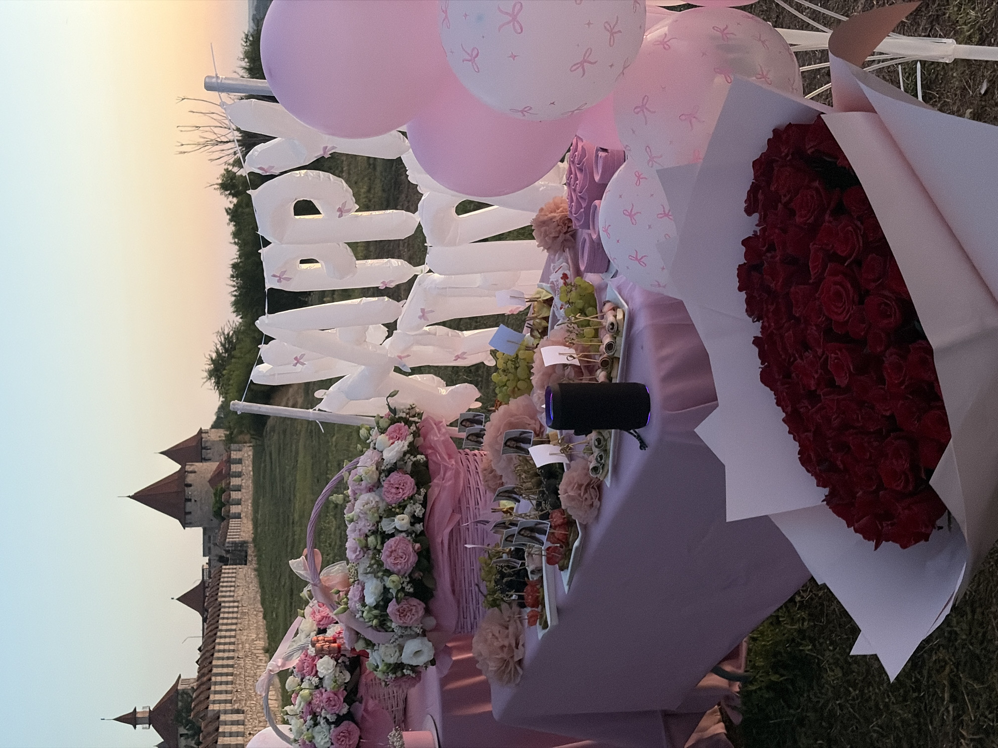 Birthday party setup at Bender Fortress under a Moldova sunset