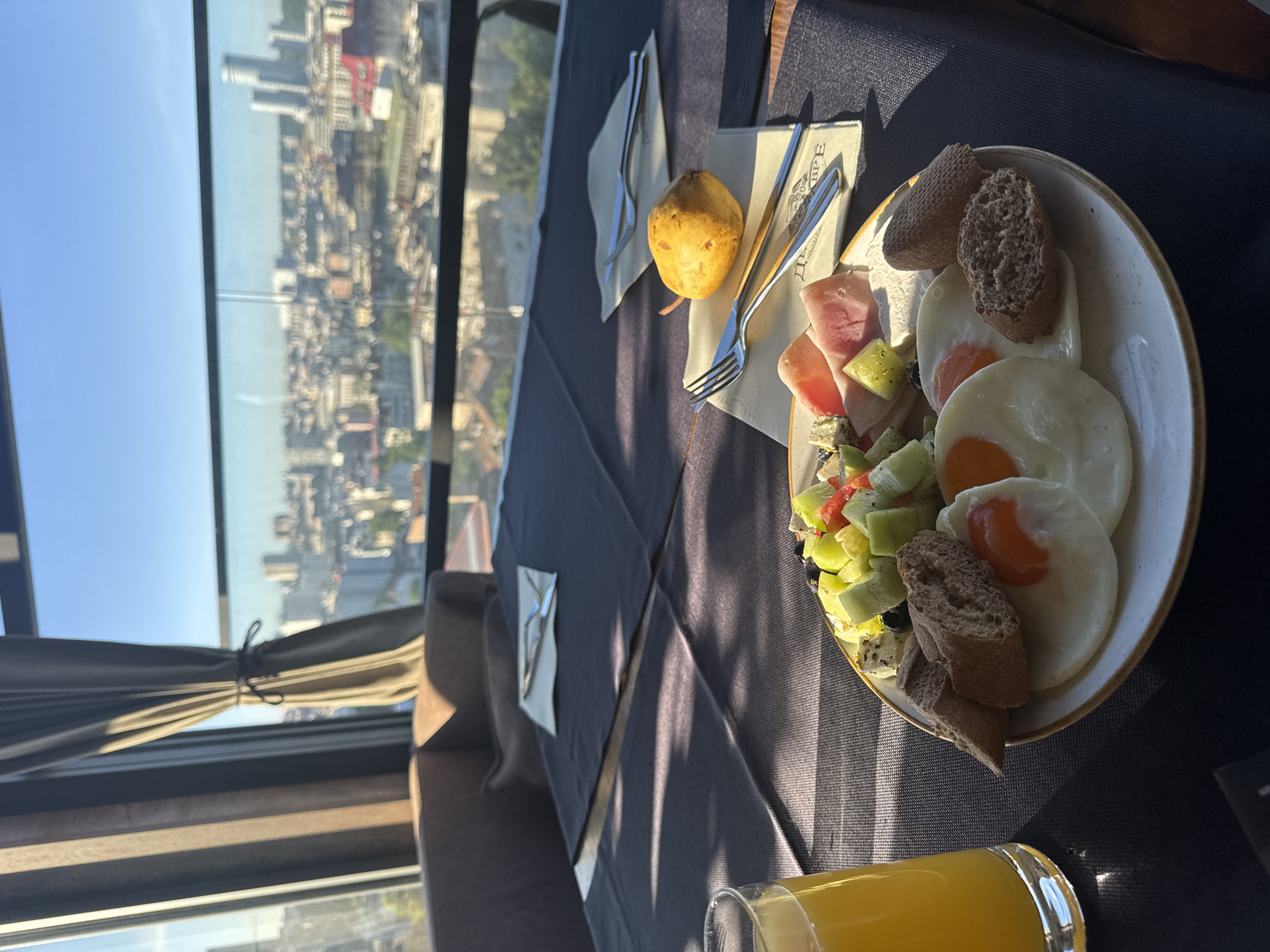 Morning meal served at Belgrade restaurant with skyline view