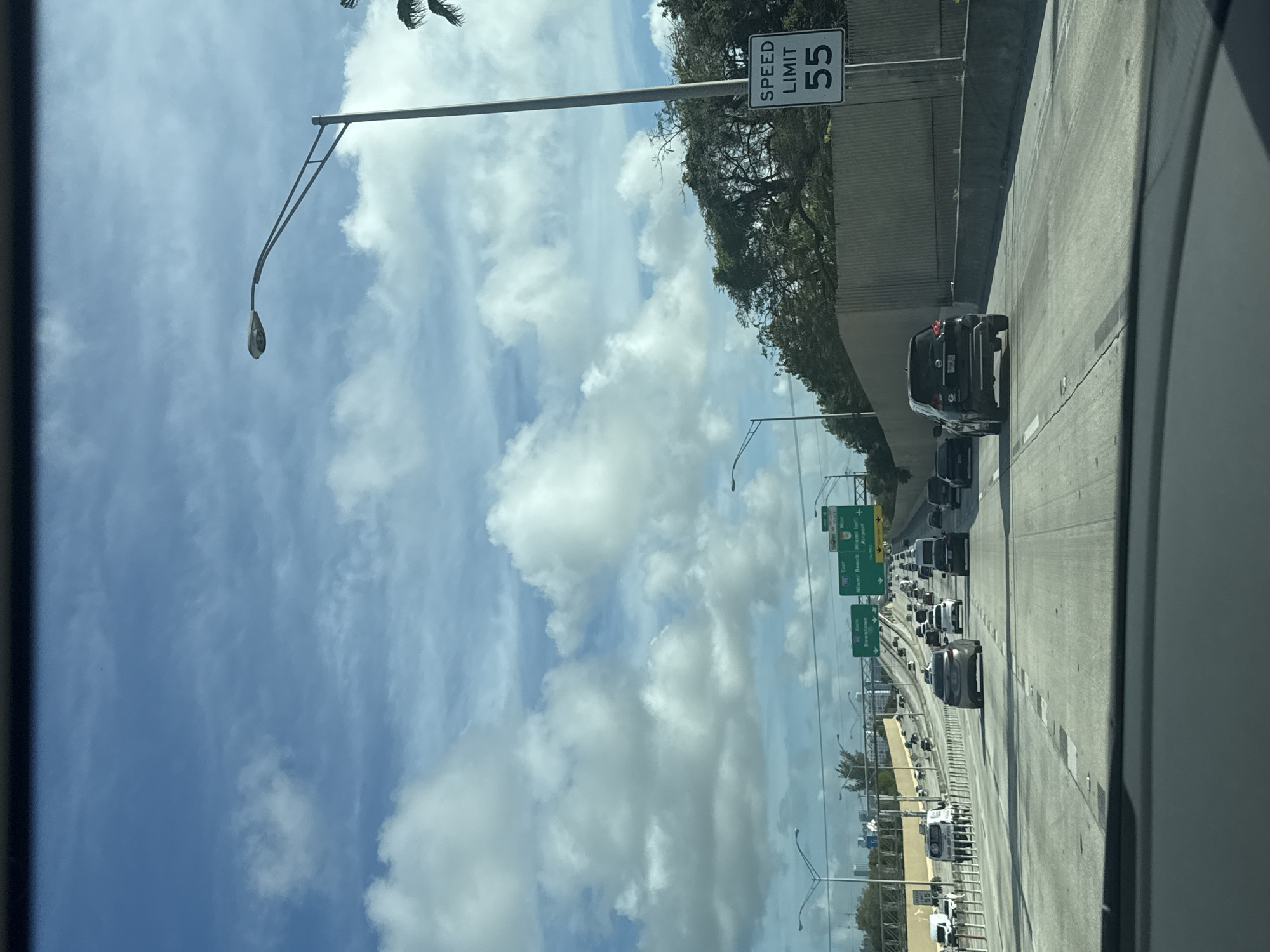 Miami highway shows moderate traffic under clear skies