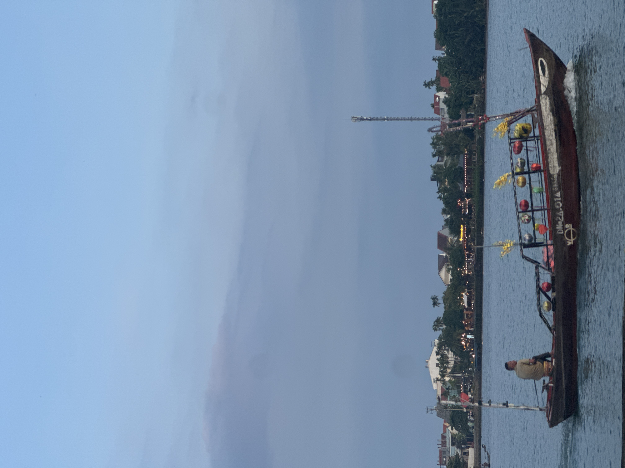 Evening boat activity and street scenes documented in Hội An