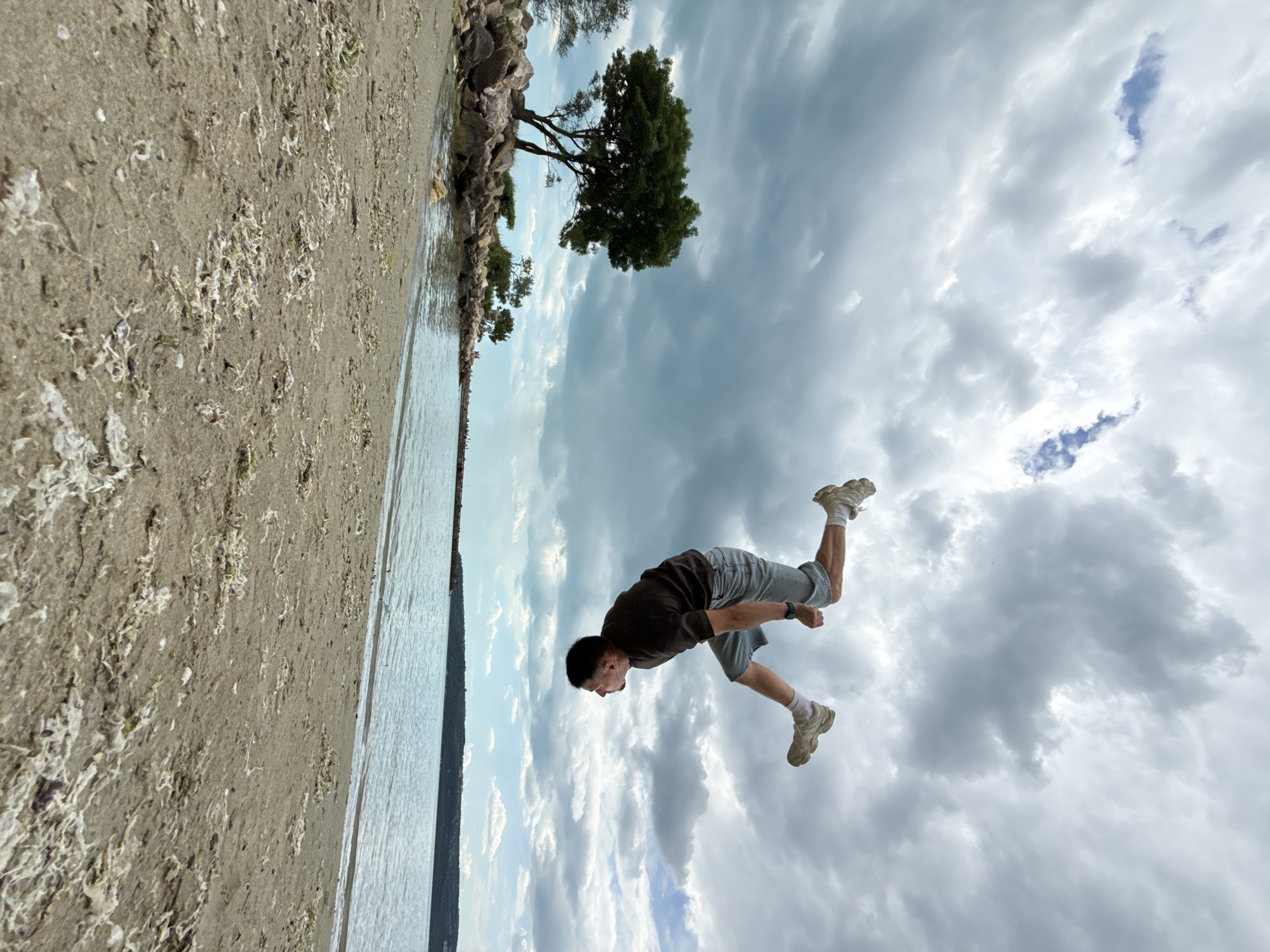 Man performs beach acrobatics in Varna, Bulgaria
