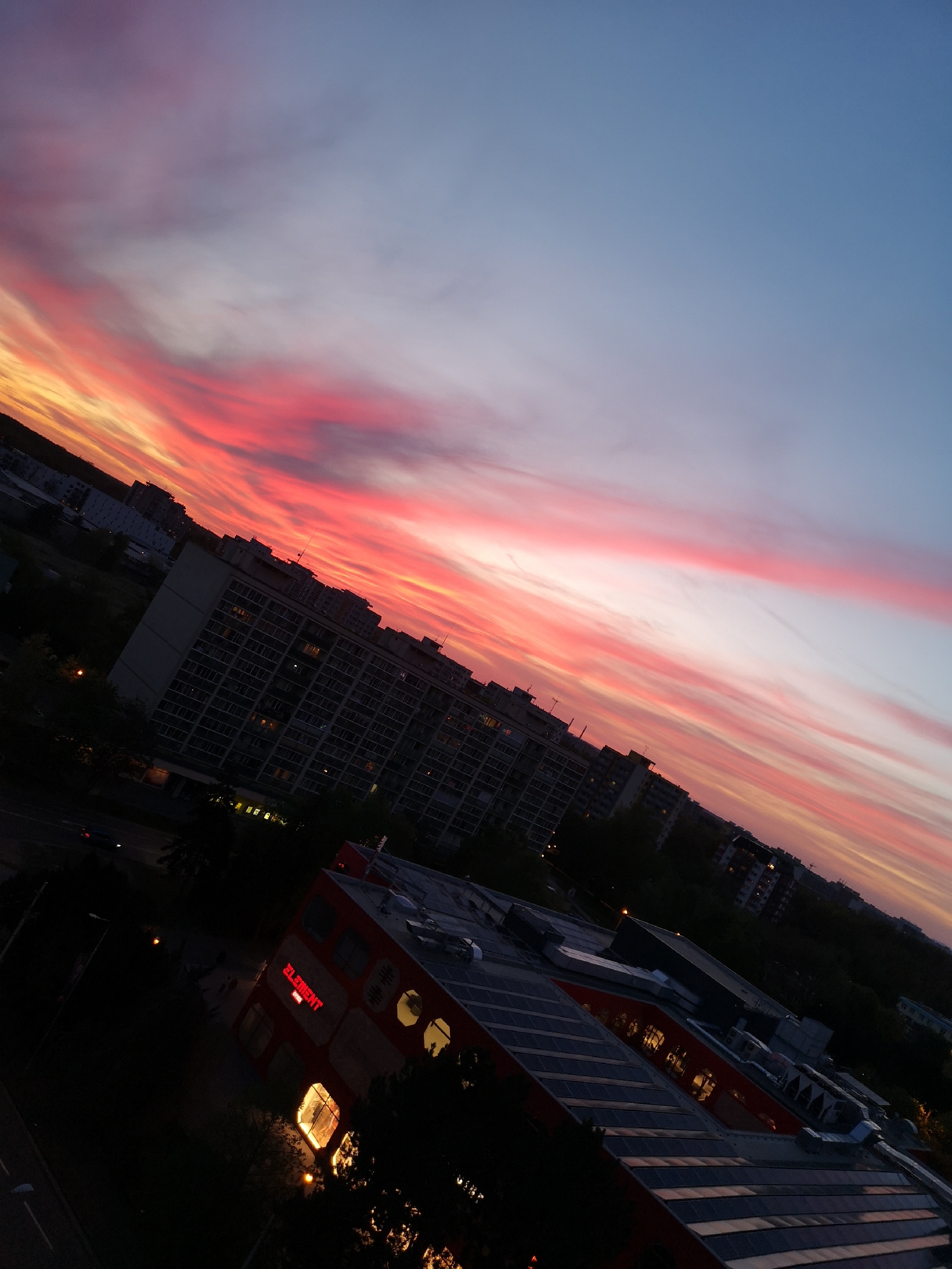Sunset displays vivid colors over Pardubice, Czechia