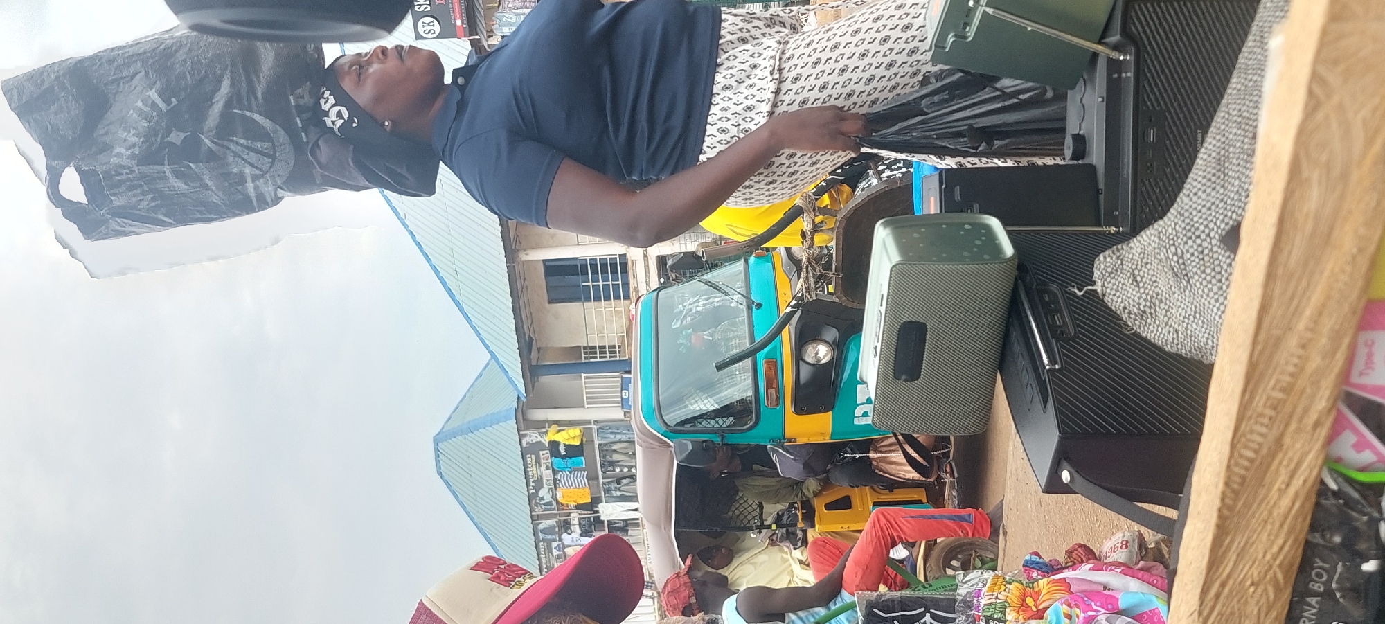 Street market bustling with vendors and commerce activity