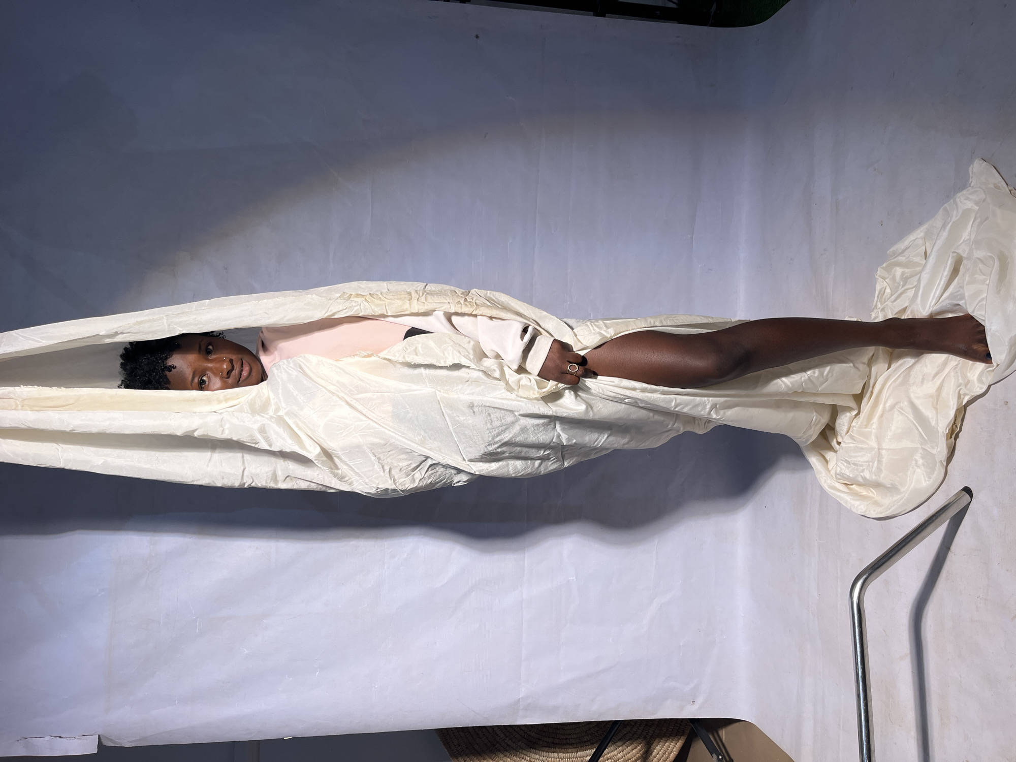 Studio photo session captures portraits with draped fabric styling