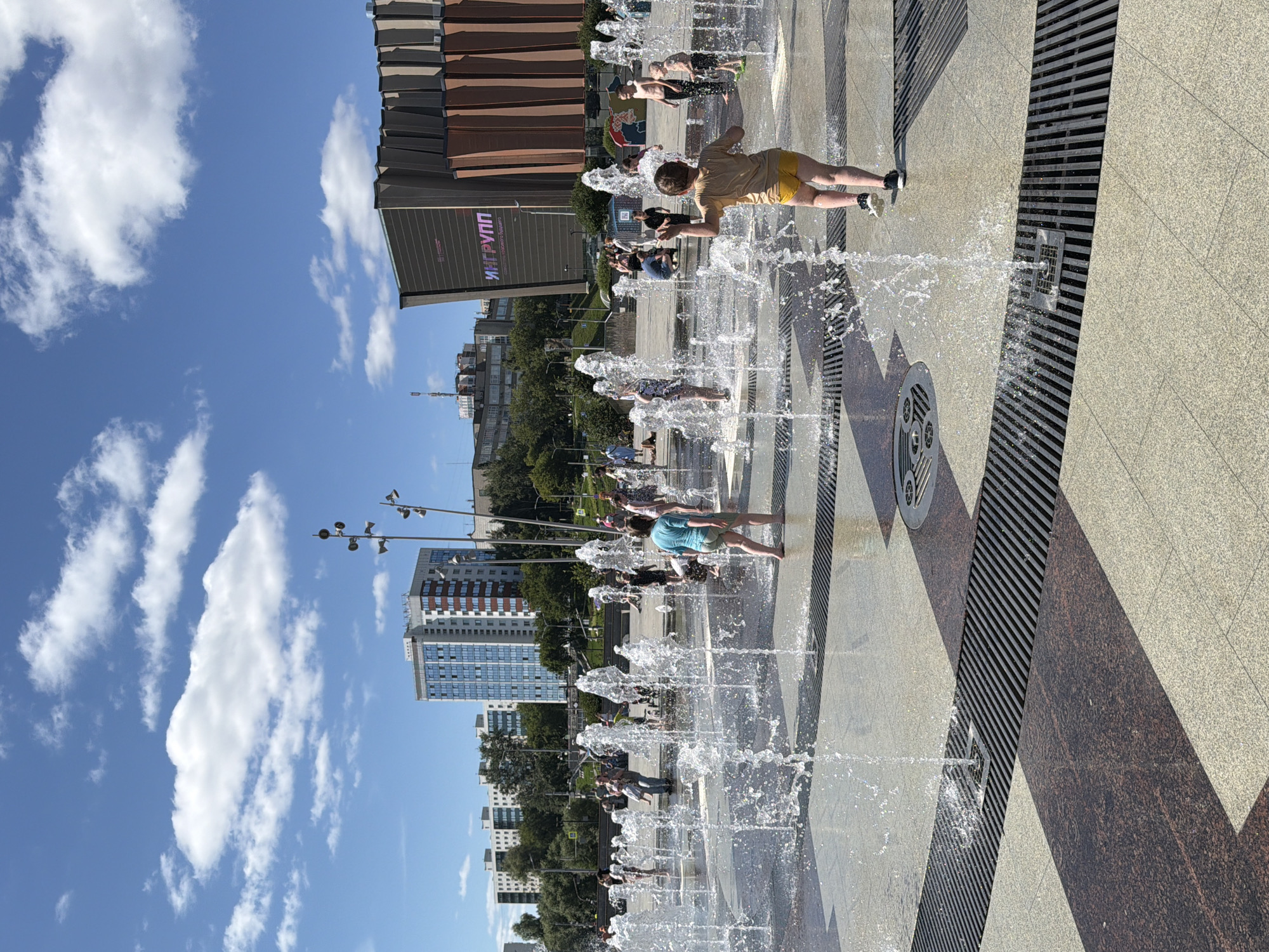 Summer morning around central Perm: streets, fountains, and city life