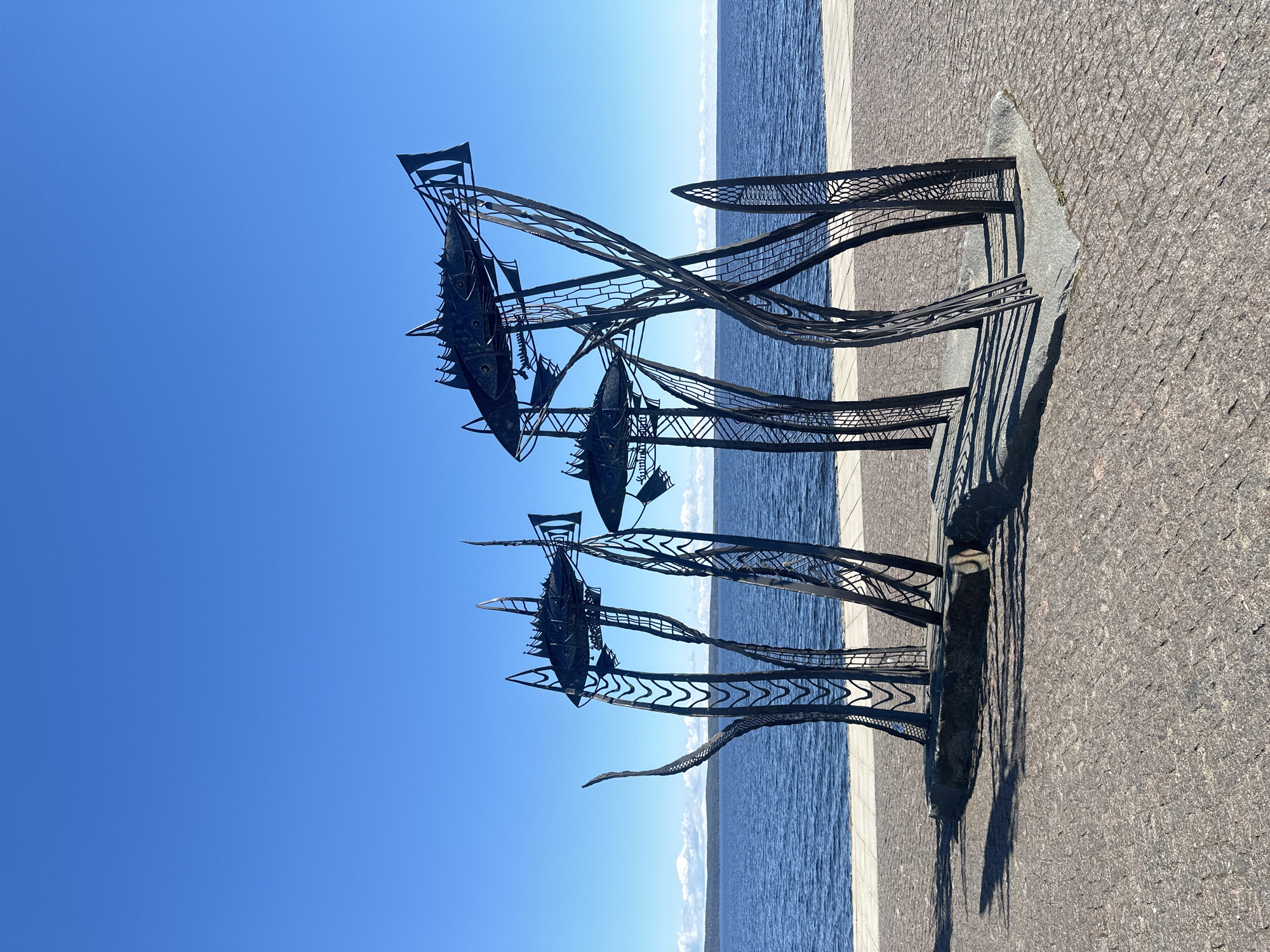 Morning park visit captures sculptures, fountain, and nature details