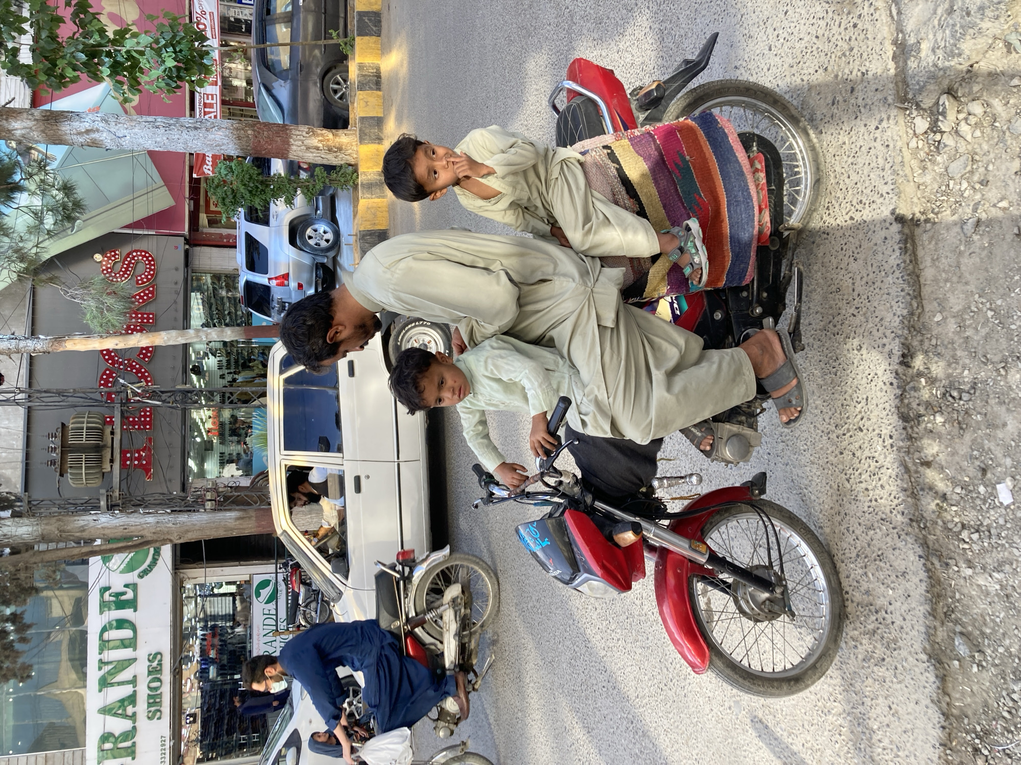 Family motorcycle outing witnessed in Quetta commercial district