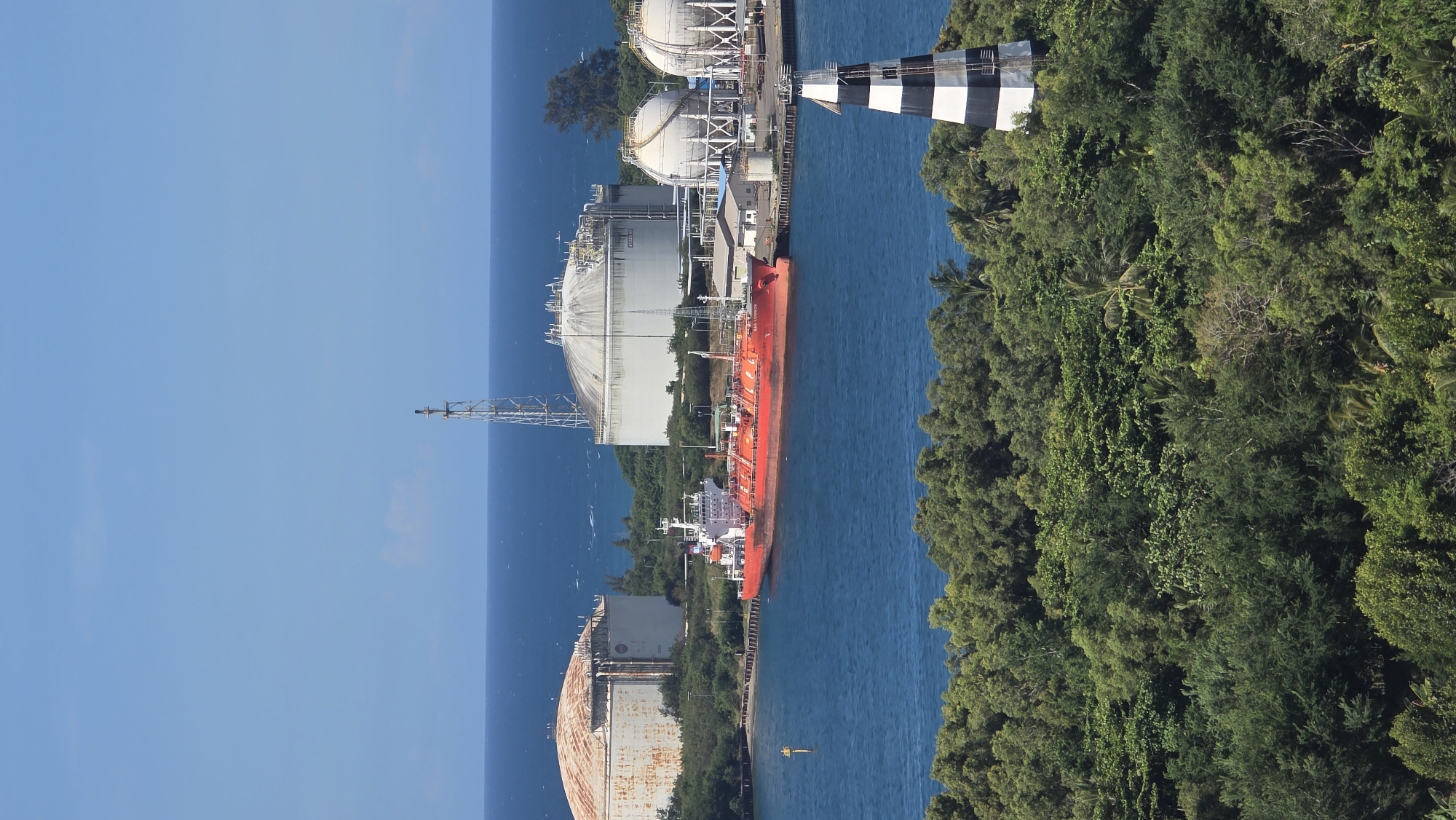 Morning documentation of everyday Lhokseumawe life captures industrial and natural scenes
