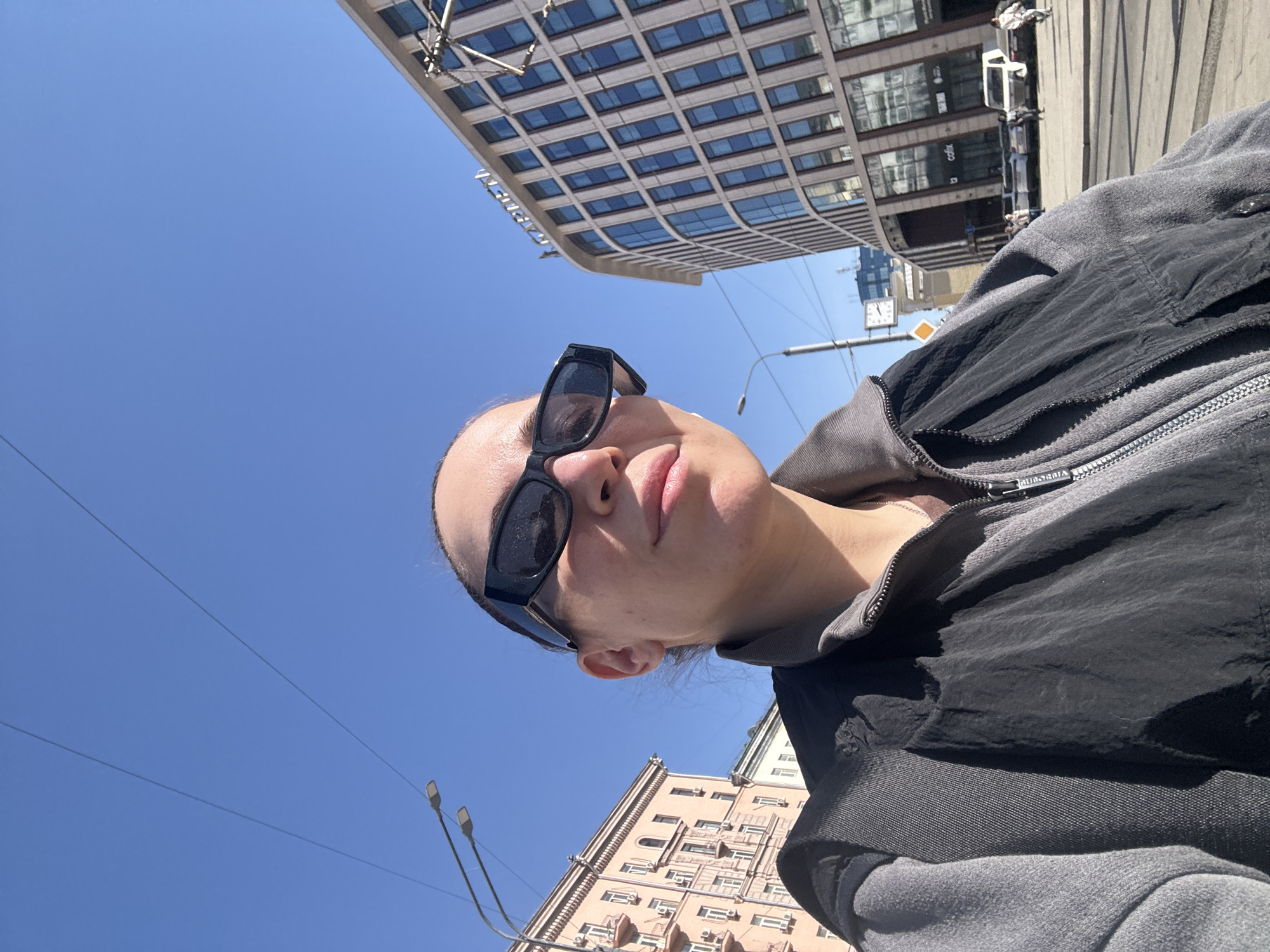 Woman photographed on Moscow street in casual moment