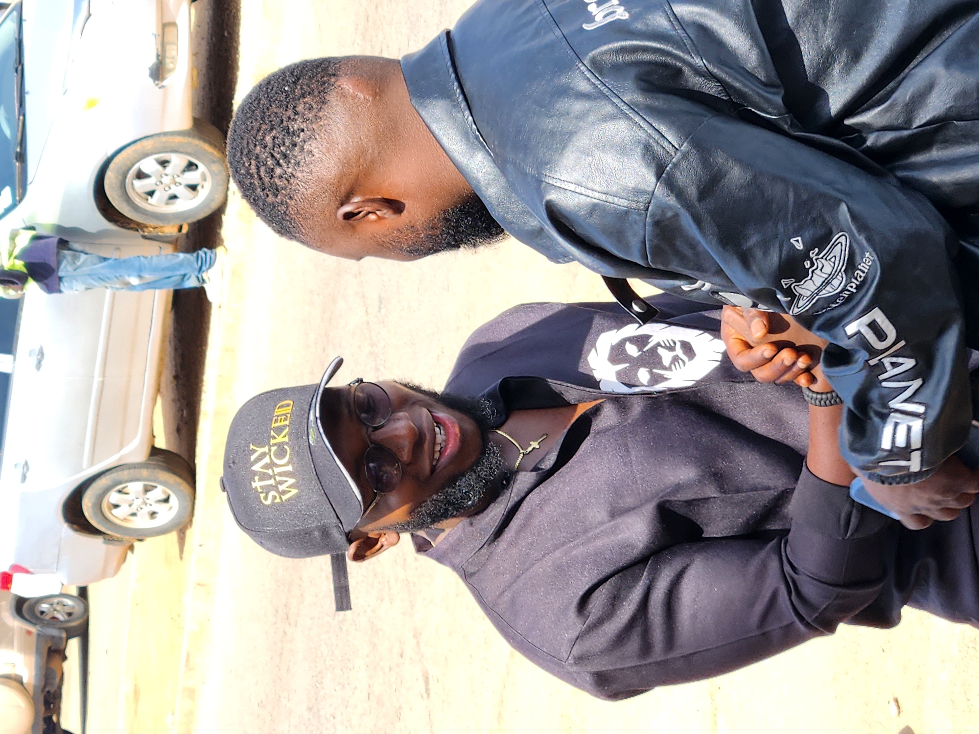 Street scenes show casual interactions in bright daylight