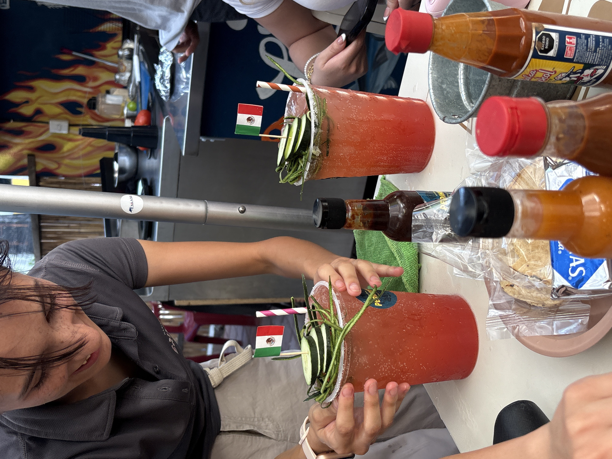Patio drinks with festive garnishes in San Pedro Garza García
