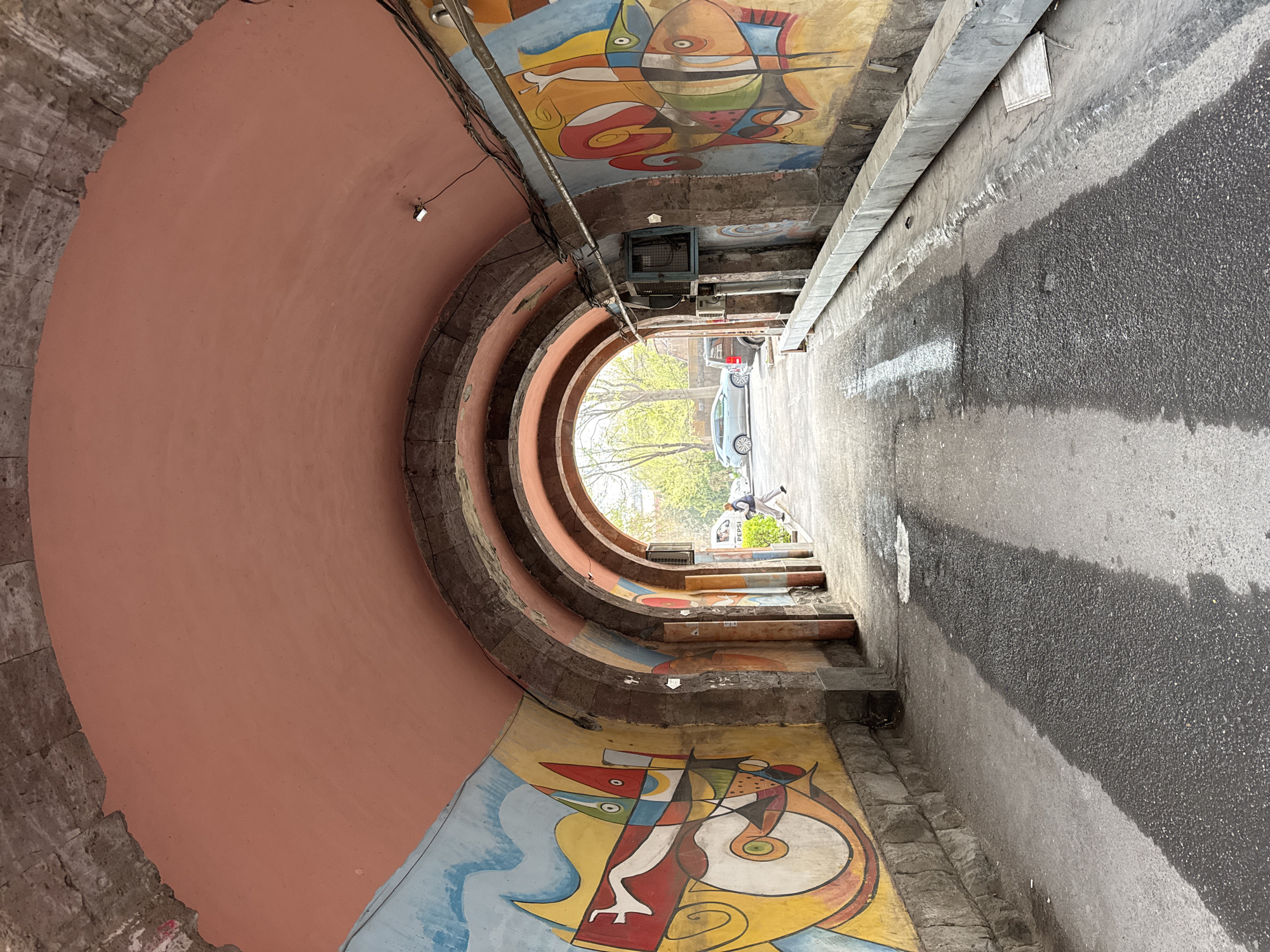 Colorful murals observed on Paparazzi Steps in Yerevan