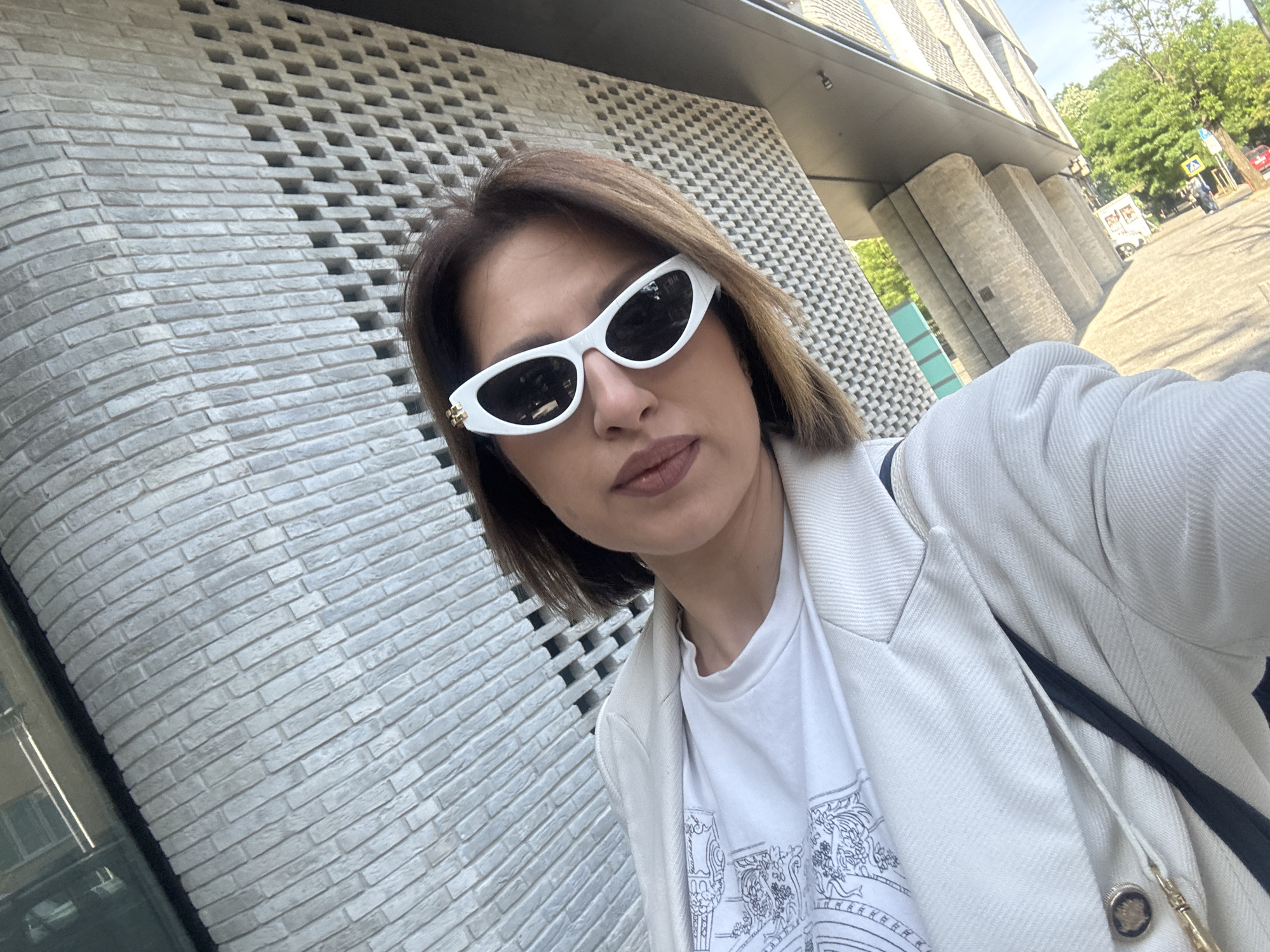 Woman documents morning outing in Sofia with selfies and street scenes