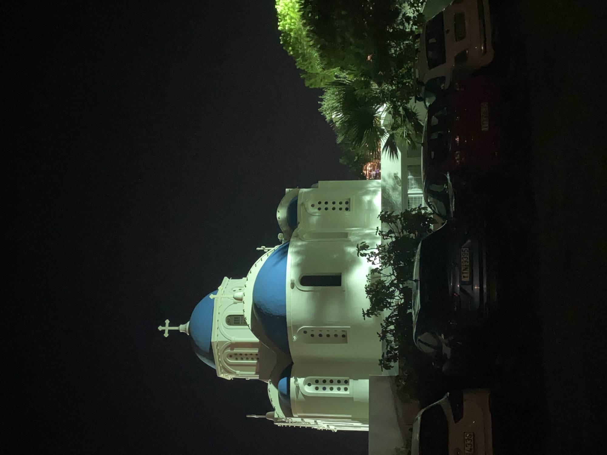 Santorini's whitewashed churches and alleys glow after dark