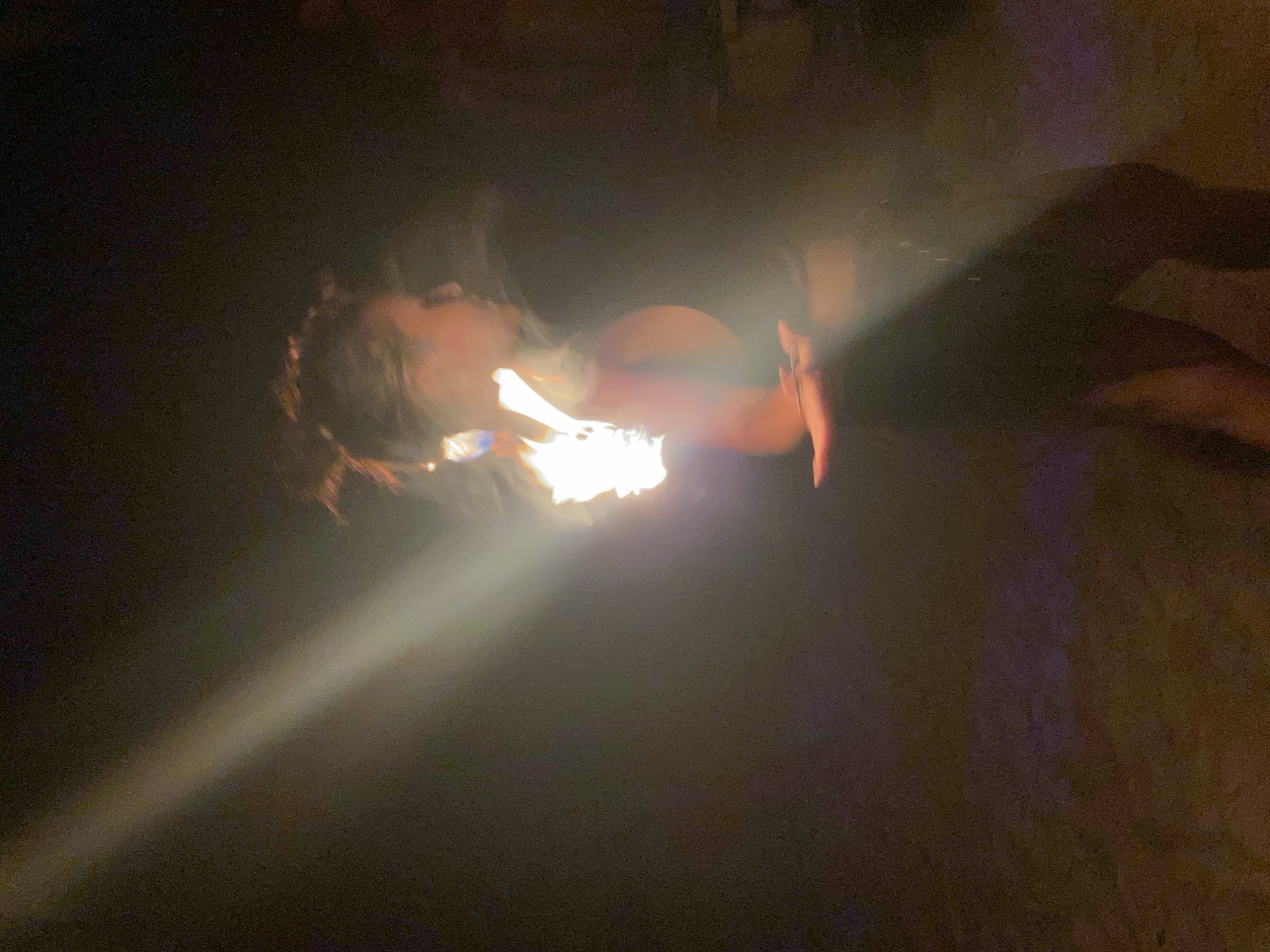 Beach bar nightlife with fire performance captured in Thailand