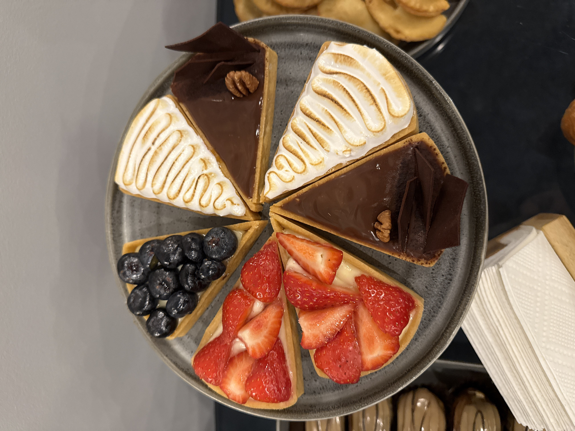 Assorted dessert tarts photographed in Perm, Russia