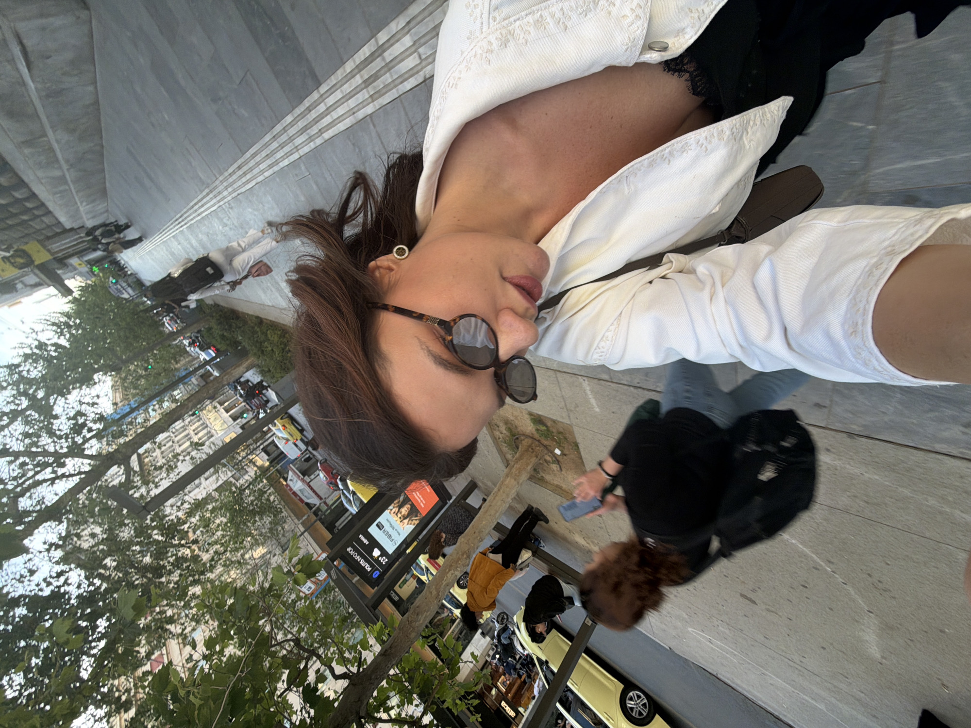Woman takes selfies on Athens street
