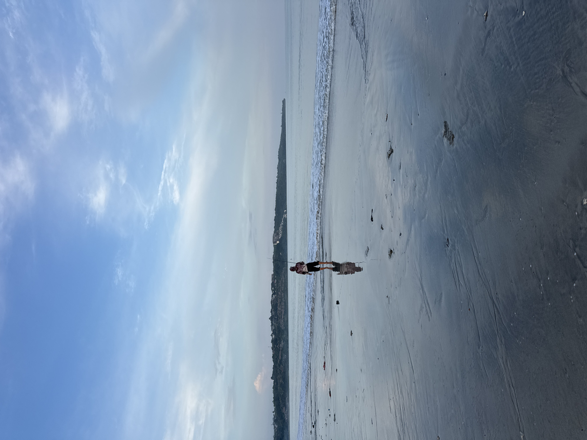 Evening fishing at Jimbaran beach, Indonesia