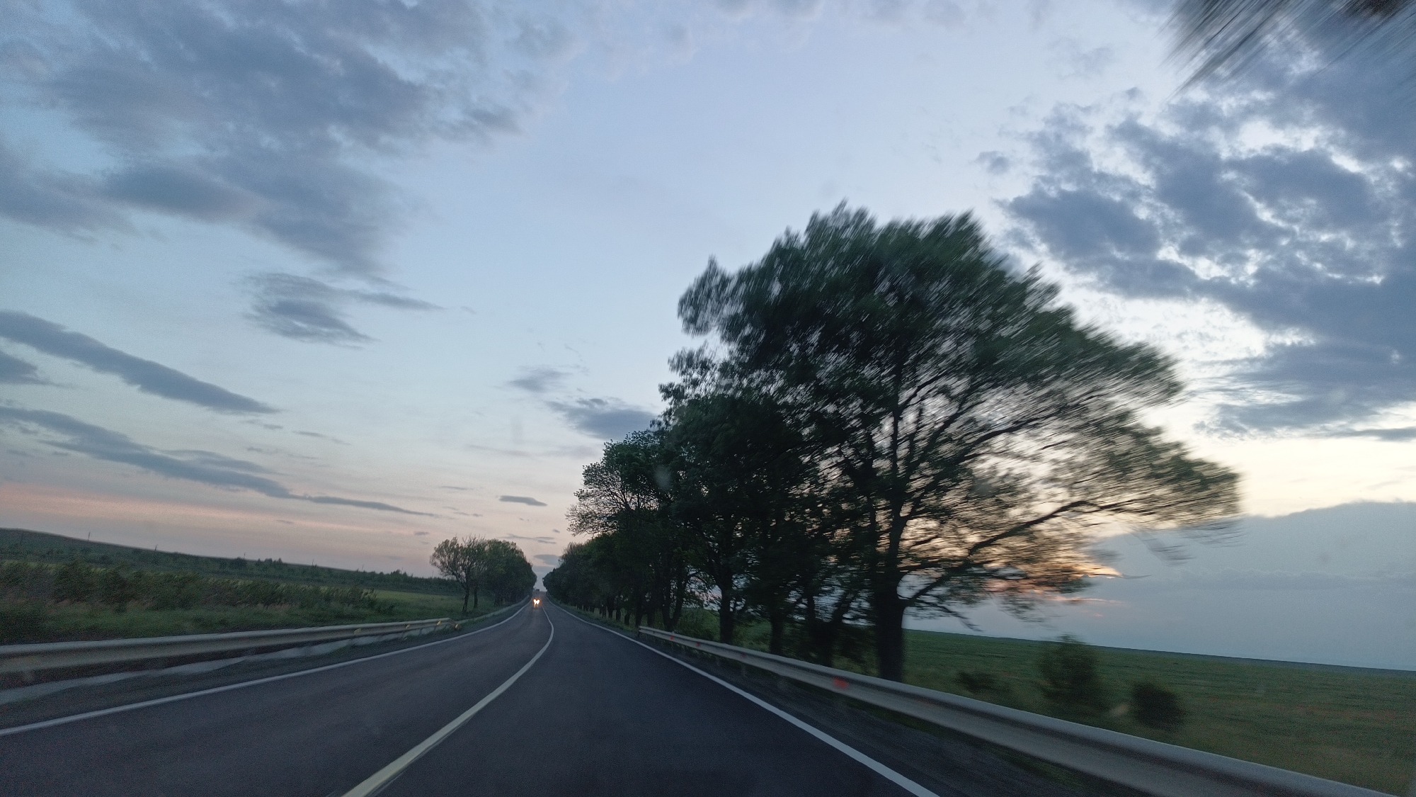 Vehicle travels two-lane road near Sokolovo, Bulgaria
