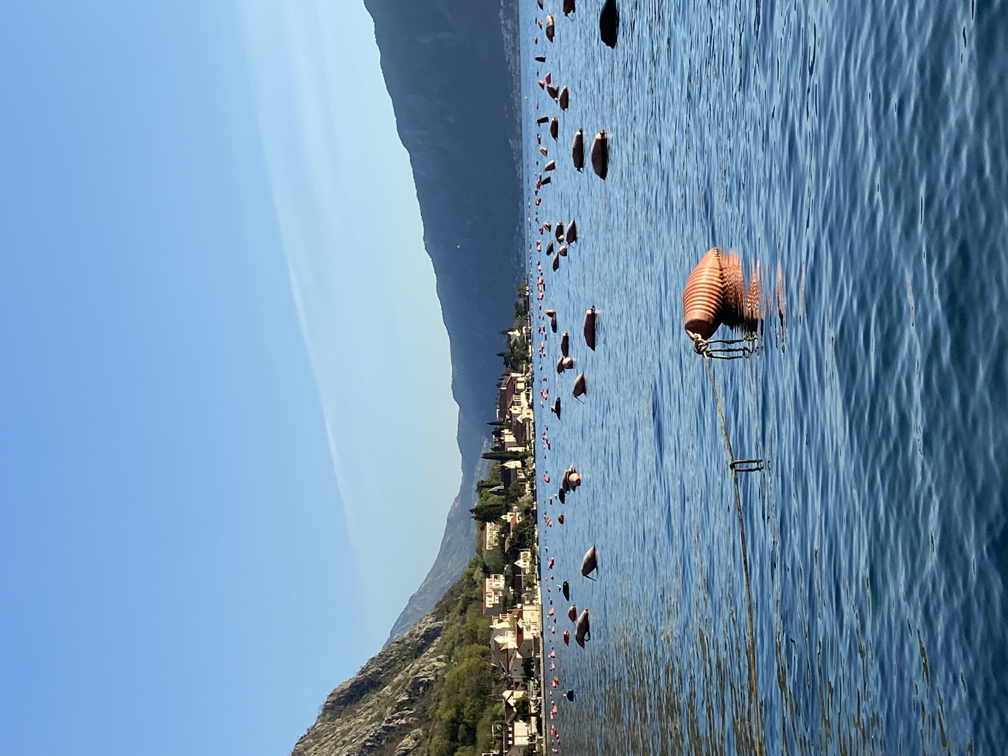 Sunny afternoon documented at Bay of Kotor, Montenegro waterfront
