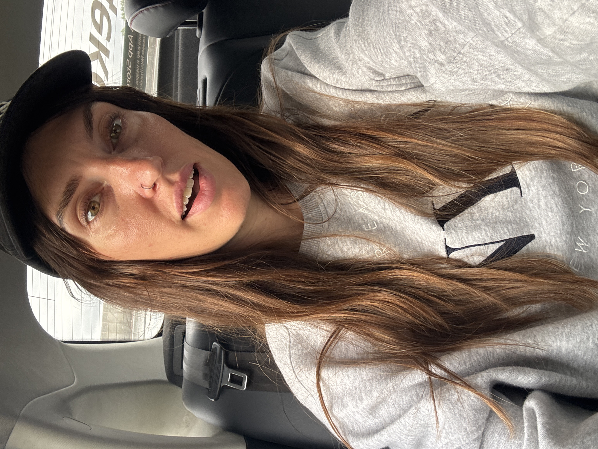 Inside a Khimki taxi, roadside views on a grey afternoon