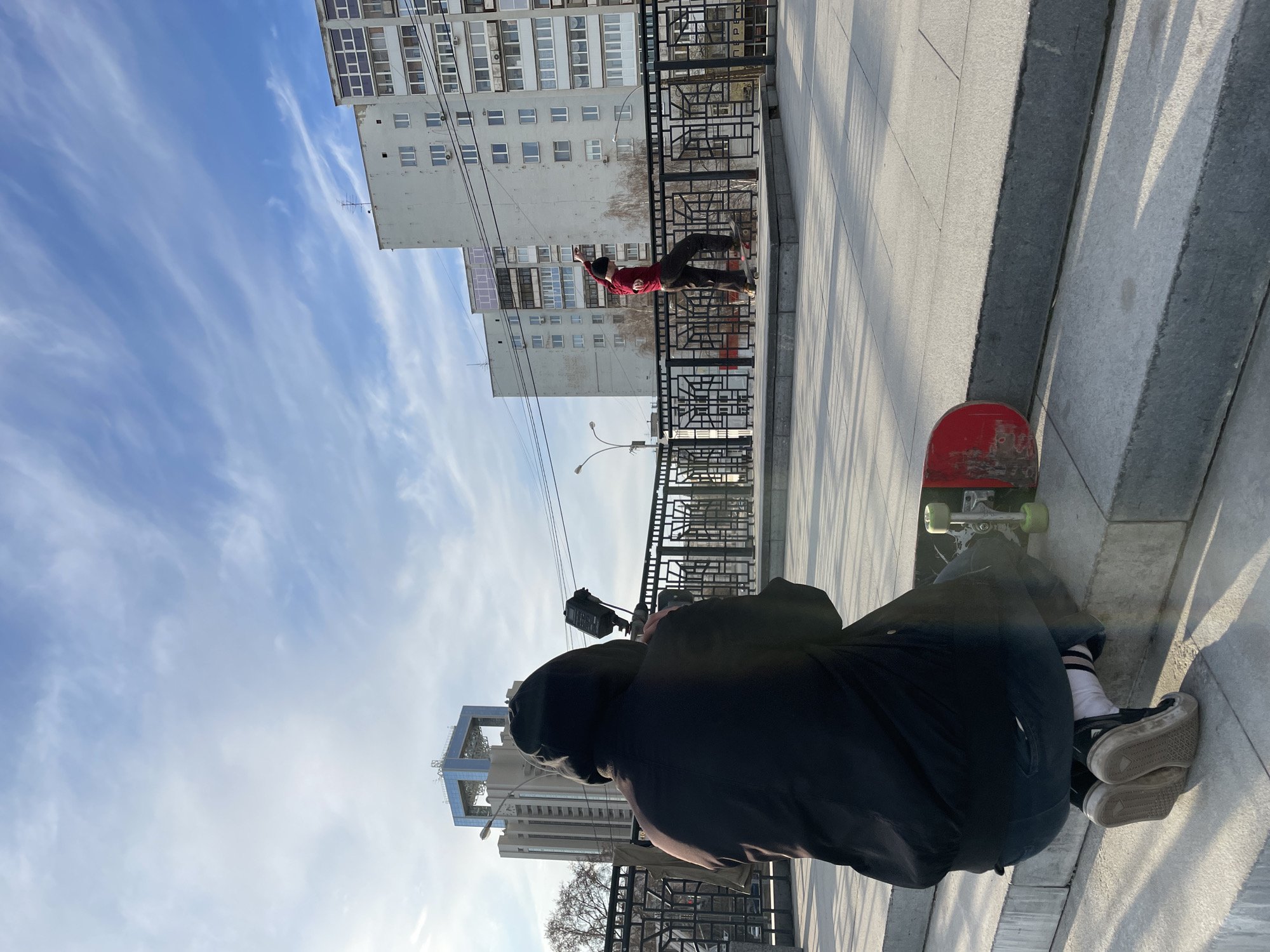 Skateboarding session documented in Yekaterinburg with photographer present