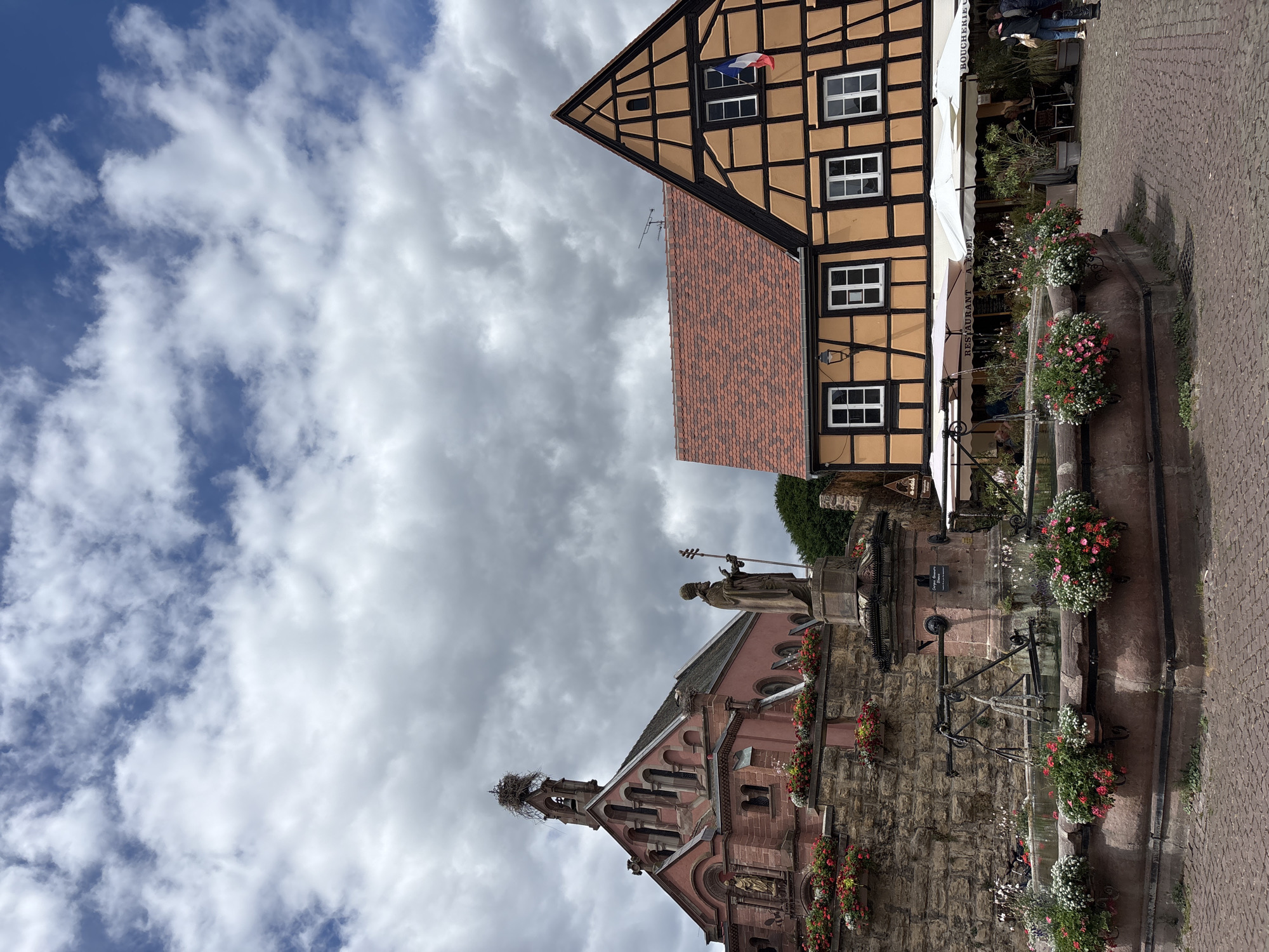 Daily life captured in historic Eguisheim, France