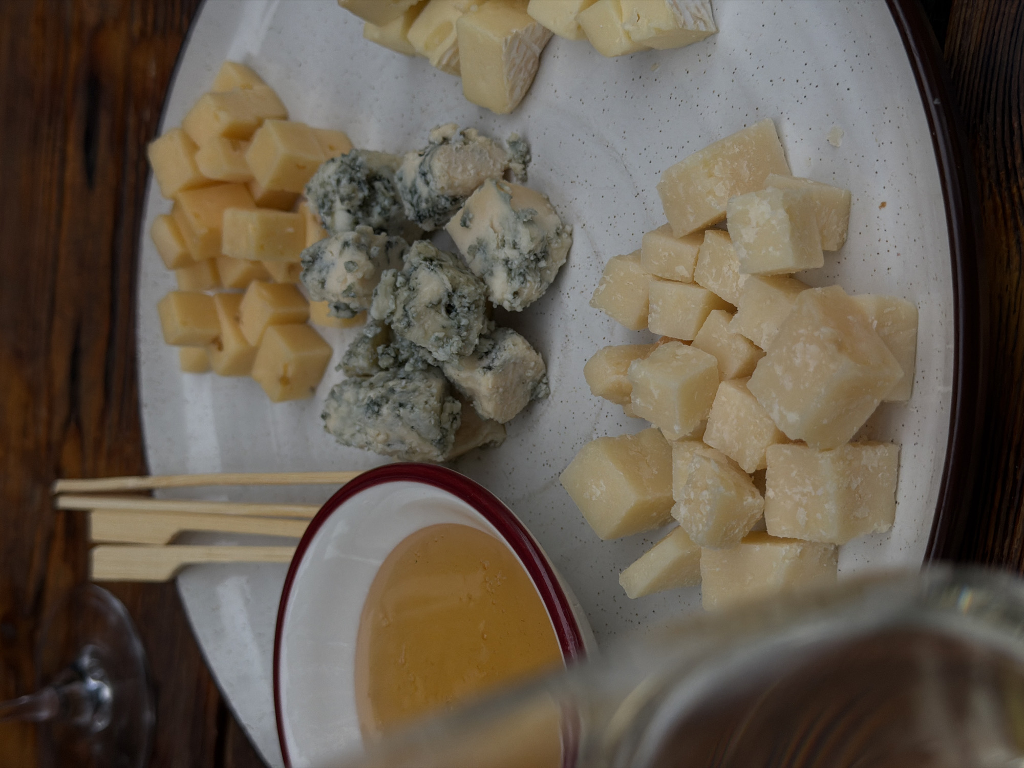 Women share wine and cheese at Bishkek outdoor cafe