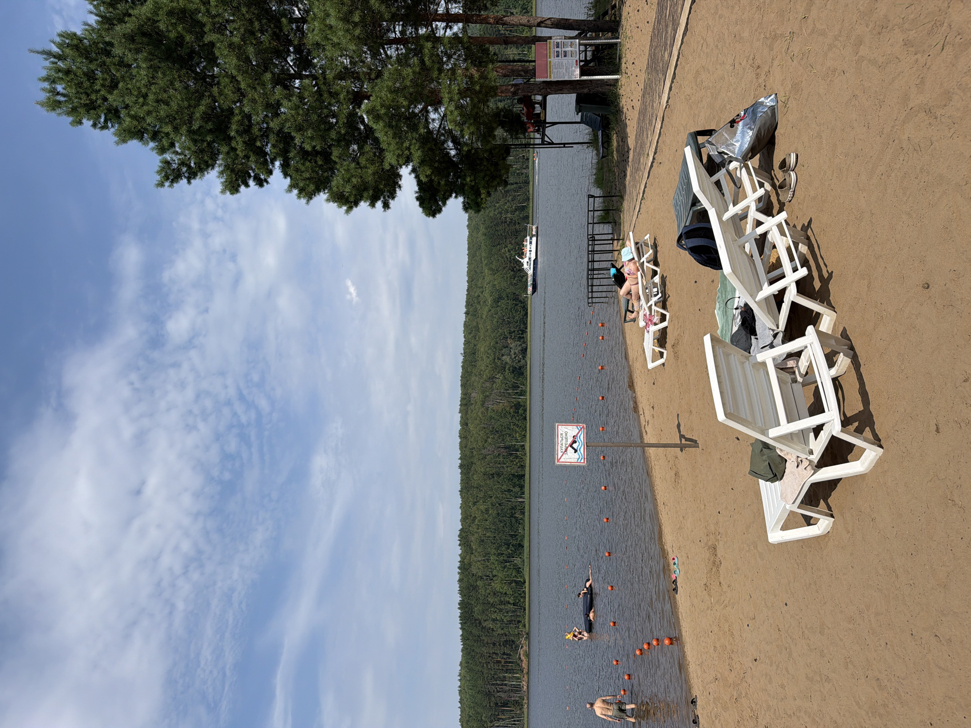 Lazy summer morning at a sandy beach in Chaykovsky